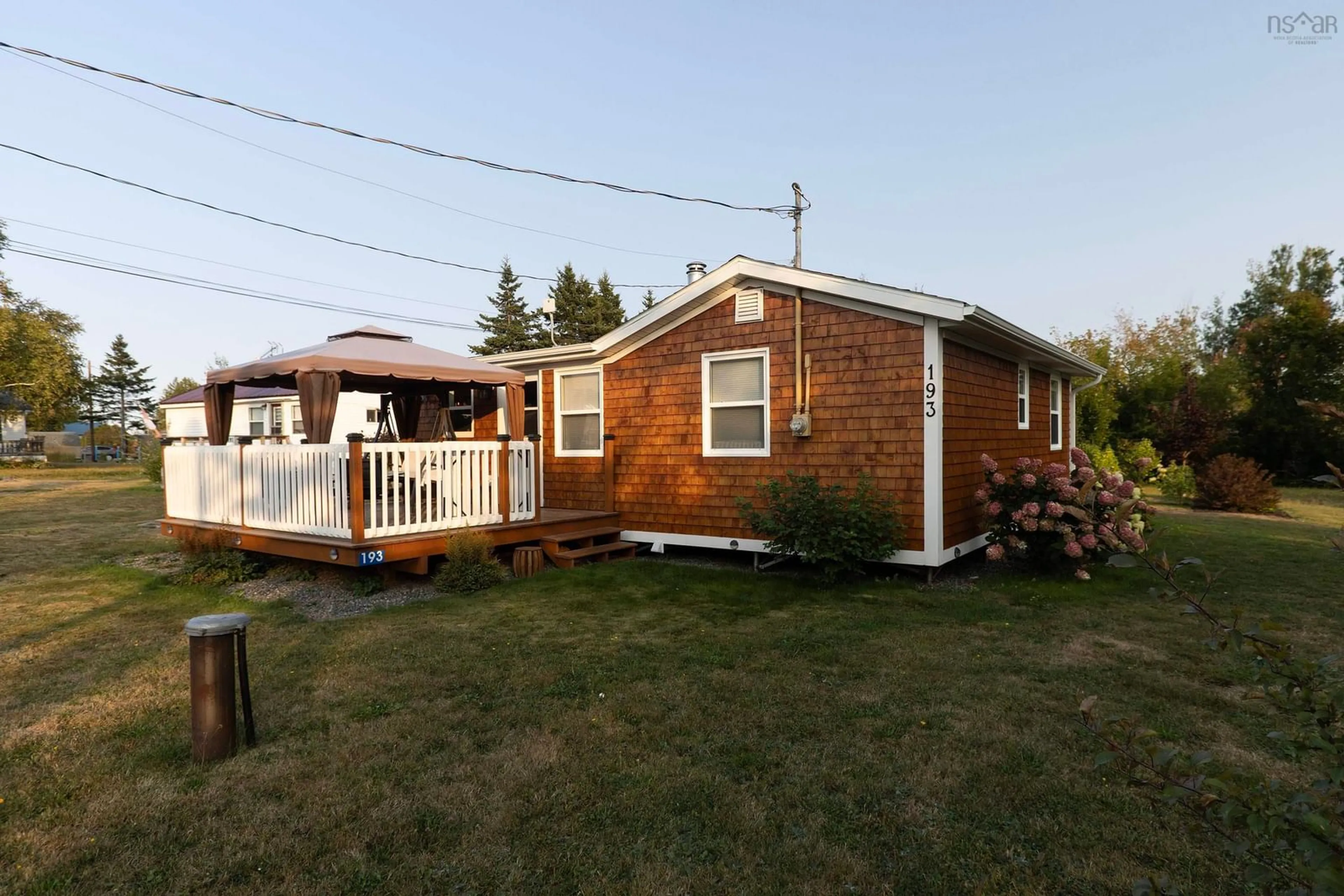 Home with vinyl exterior material, street for 193 Jackson Point Rd, Tidnish Bridge Nova Scotia B4H 3X5