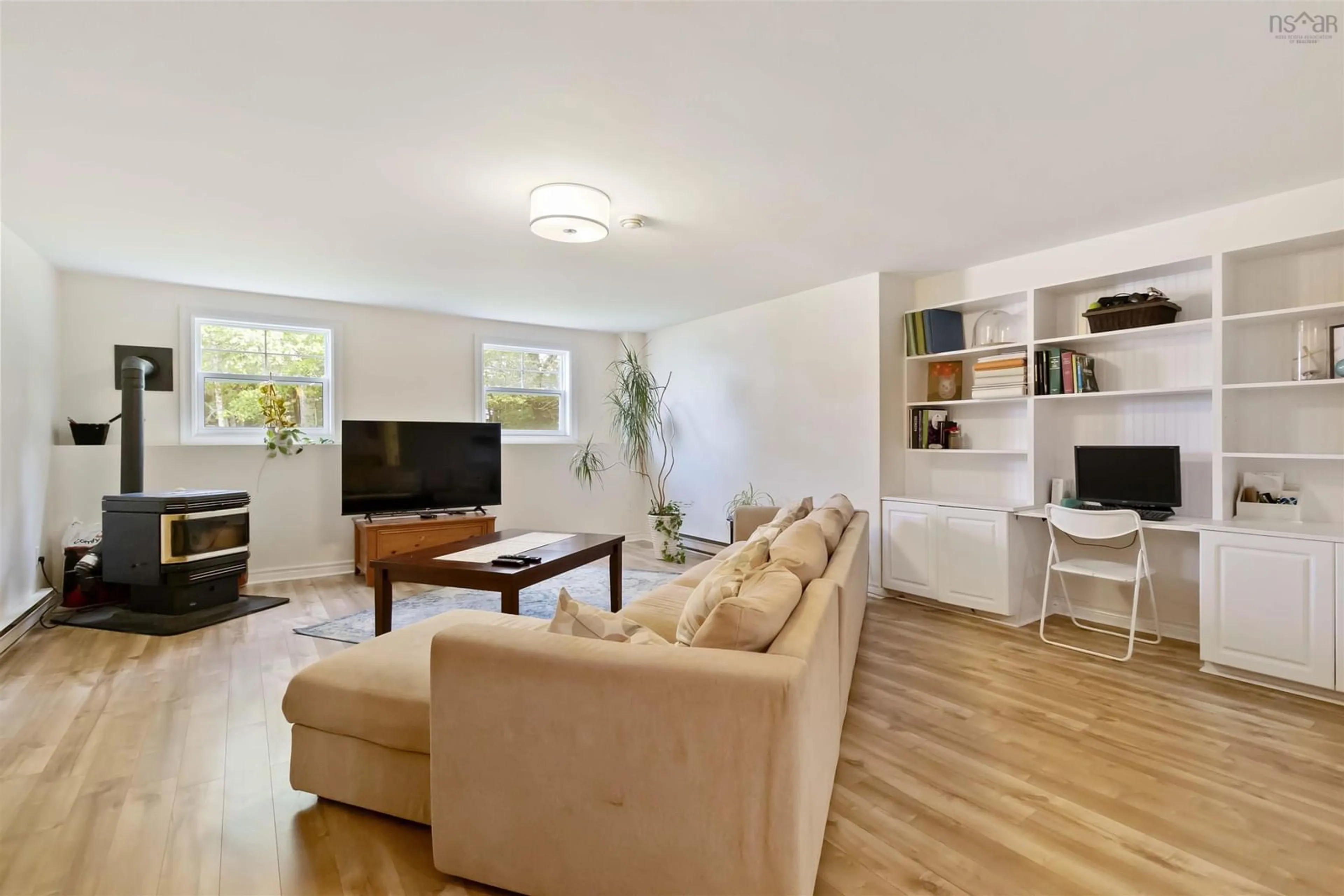 Living room with furniture, wood/laminate floor for 28 Flinns Hill, Bedford Nova Scotia B4A 3S8