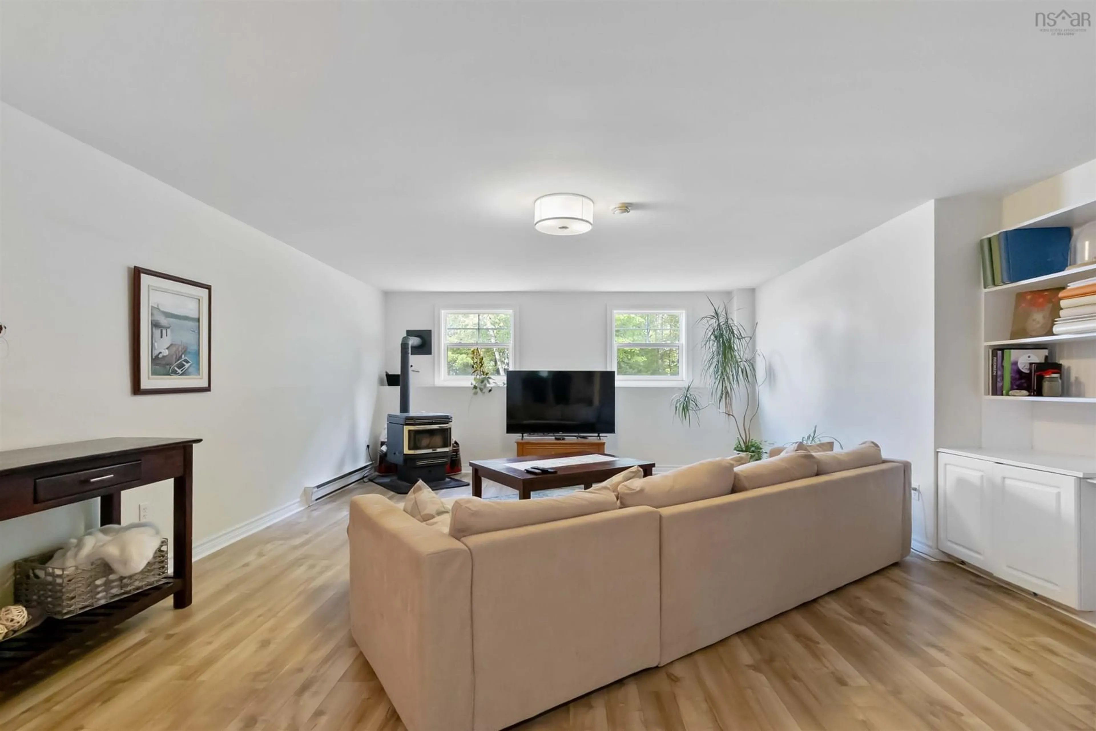 Living room with furniture, wood/laminate floor for 28 Flinns Hill, Bedford Nova Scotia B4A 3S8