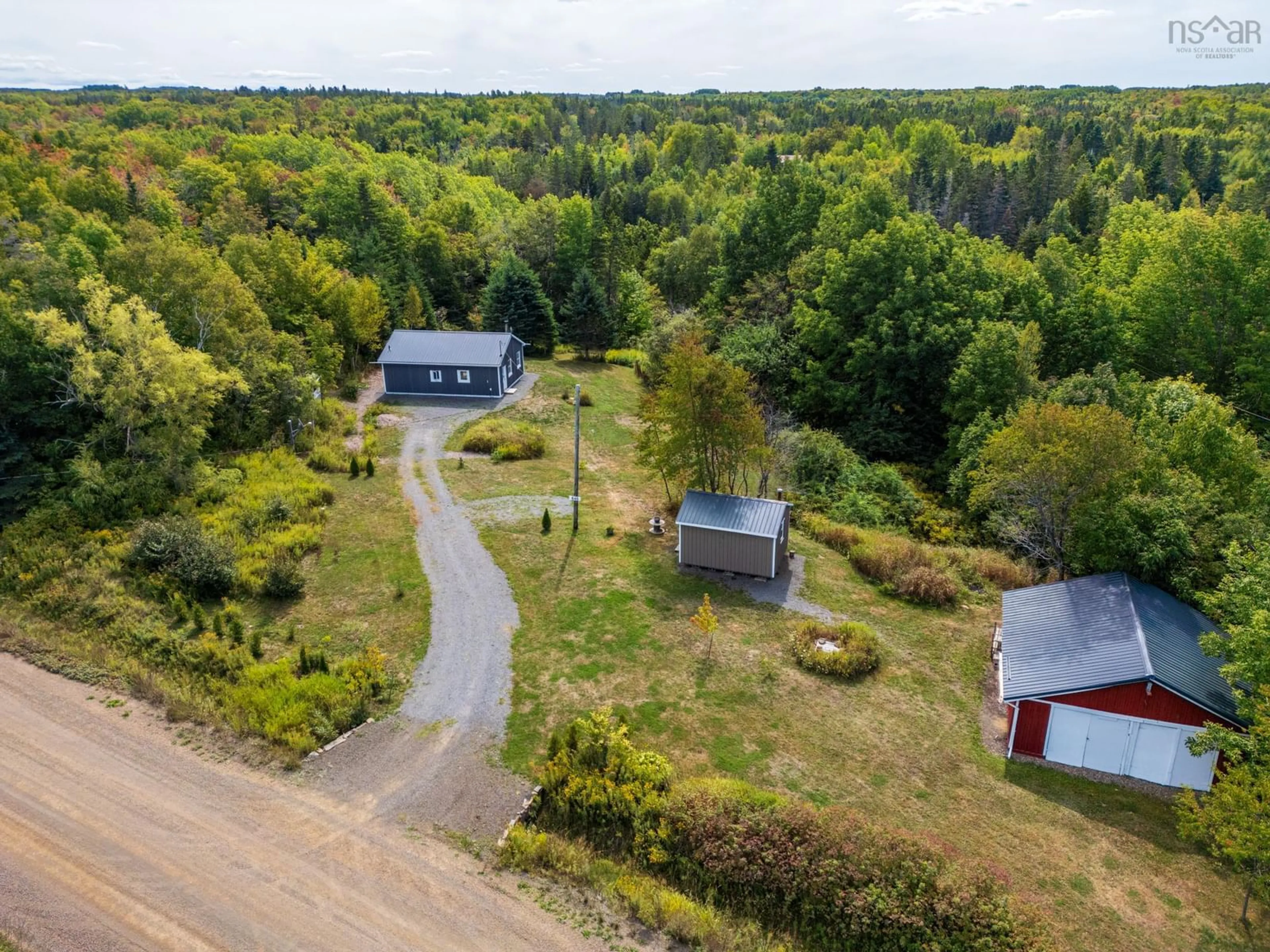 A pic from outside/outdoor area/front of a property/back of a property/a pic from drone, forest/trees view for 646 Russia Rd, Black Rock Nova Scotia B0P 1V0
