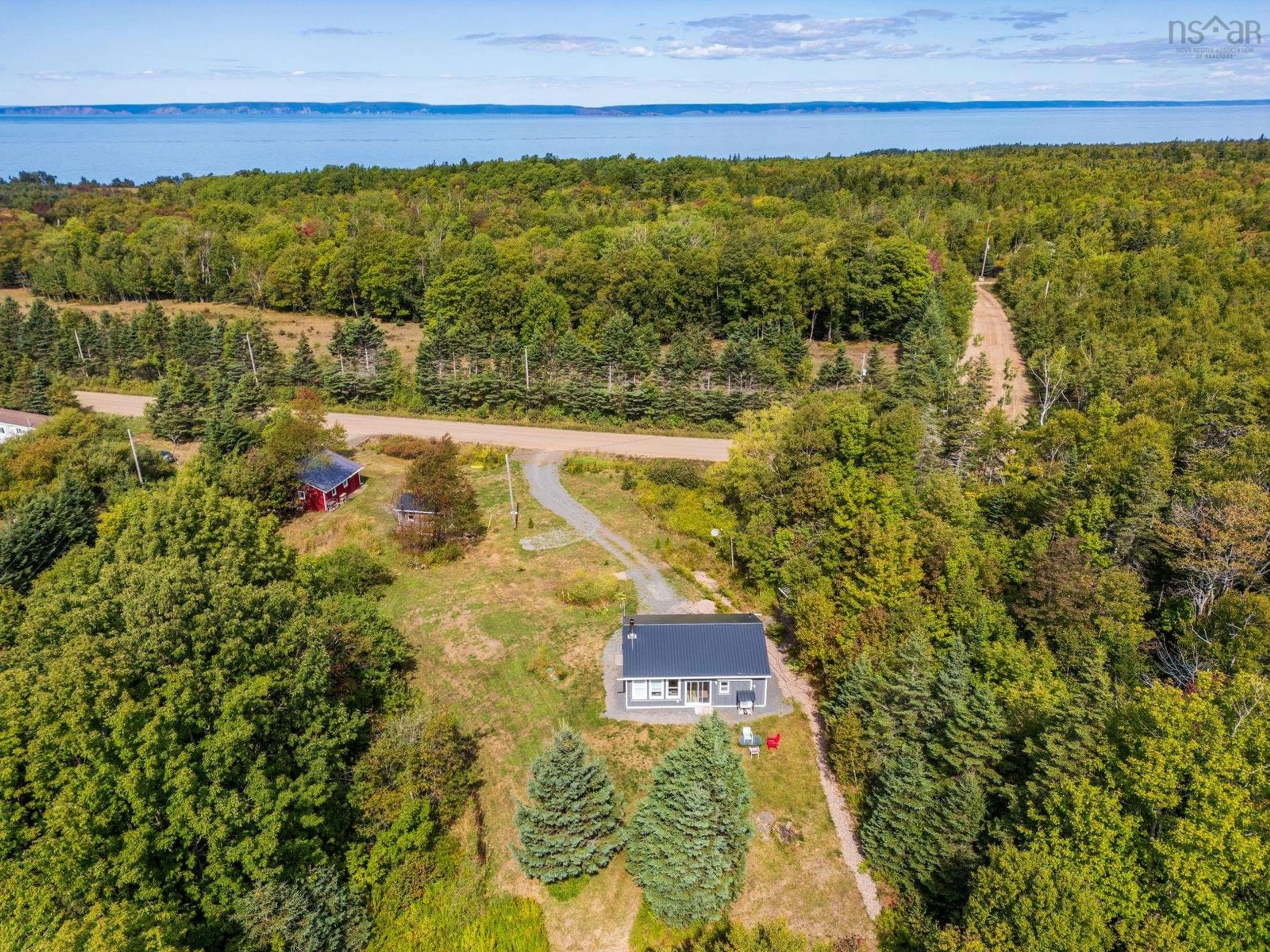 A pic from outside/outdoor area/front of a property/back of a property/a pic from drone, water/lake/river/ocean view for 646 Russia Rd, Black Rock Nova Scotia B0P 1V0