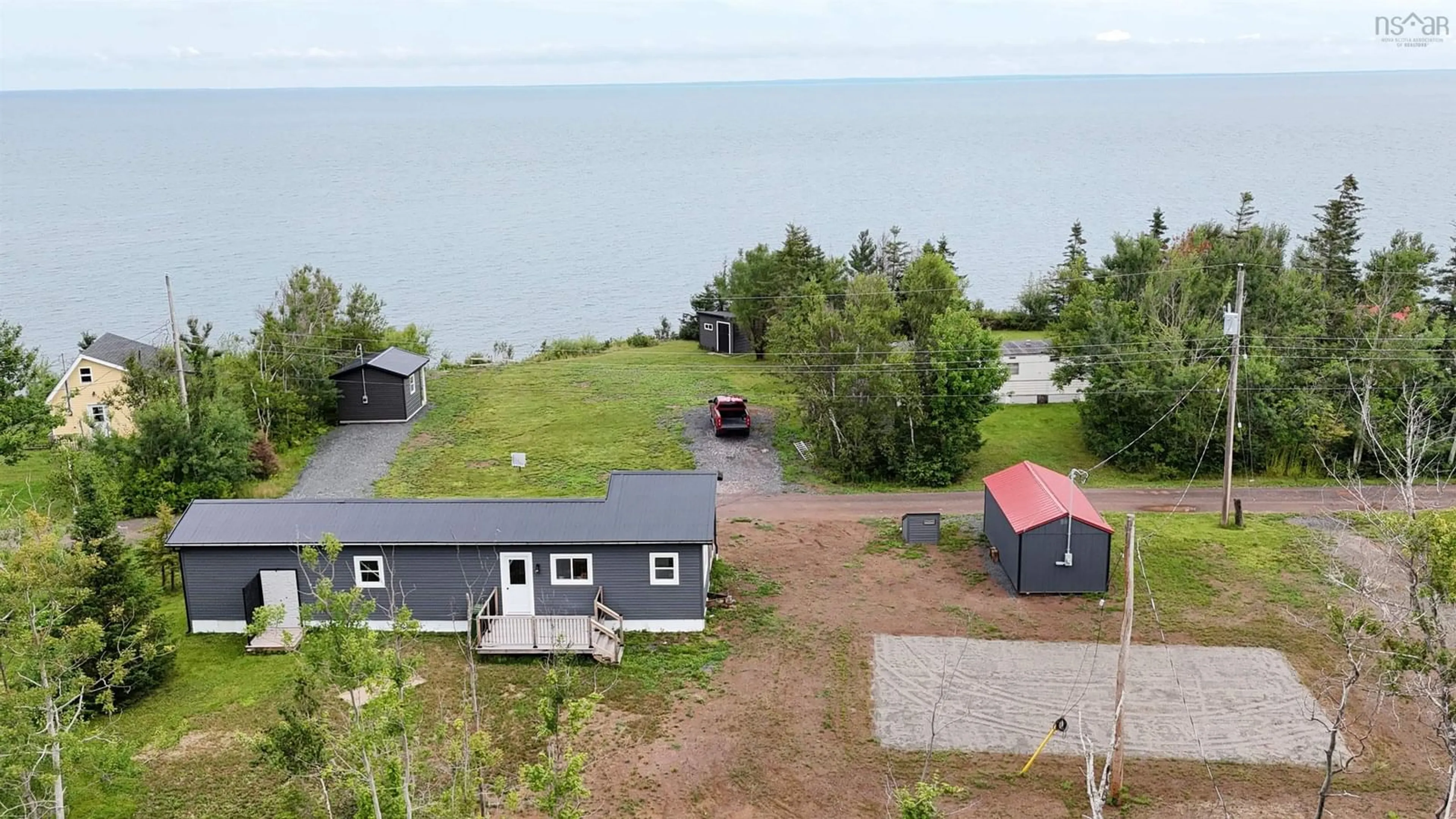 A pic from outside/outdoor area/front of a property/back of a property/a pic from drone, water/lake/river/ocean view for 124 & 115 Red Cliff Dr, Seafoam Nova Scotia B0K 1N0