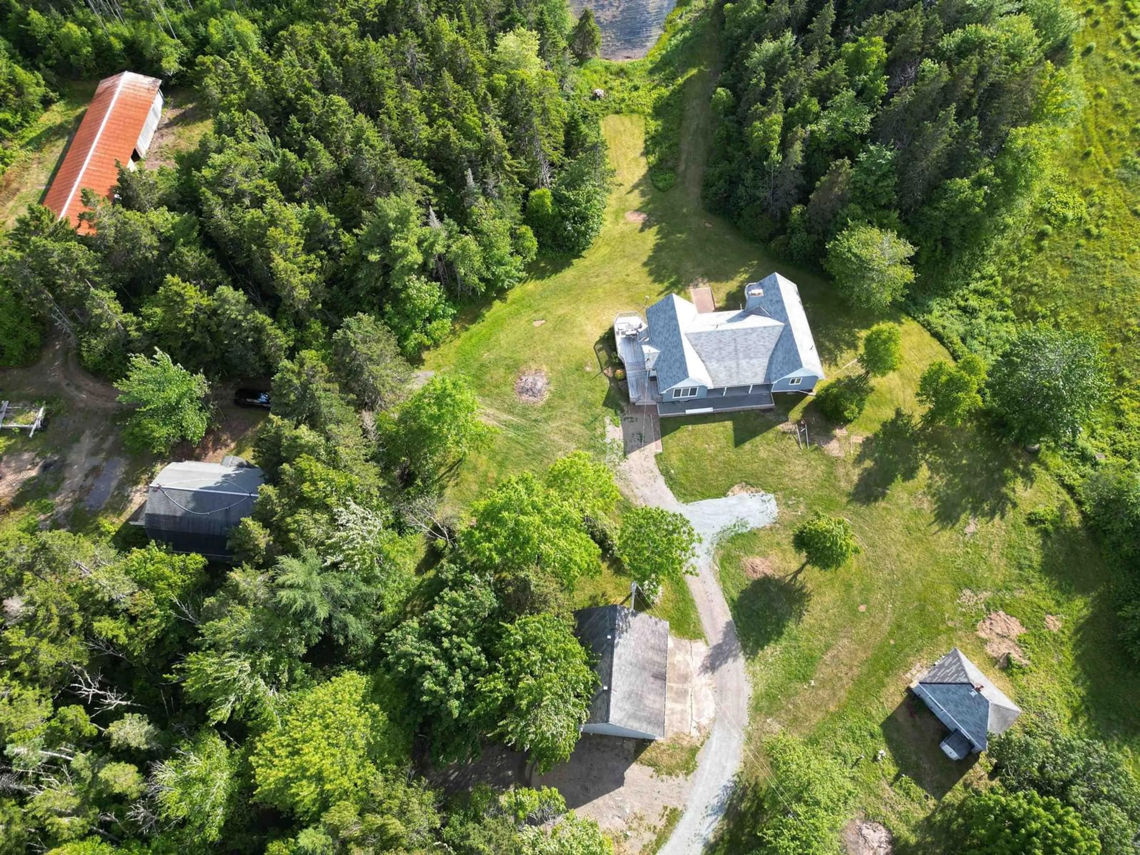 A pic from outside/outdoor area/front of a property/back of a property/a pic from drone, forest/trees view for 9169 Highway 16, Cooks Cove Nova Scotia B0H 1N0