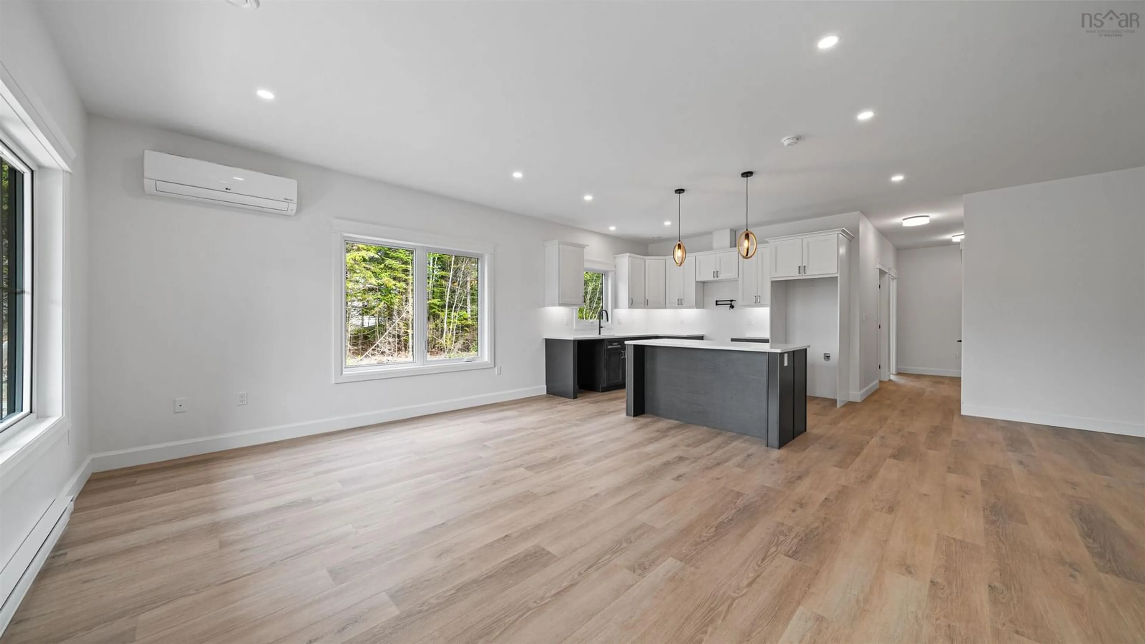Open concept kitchen, wood/laminate floor for 121 Grandview Terr, East Uniacke Nova Scotia B0N 1Z0