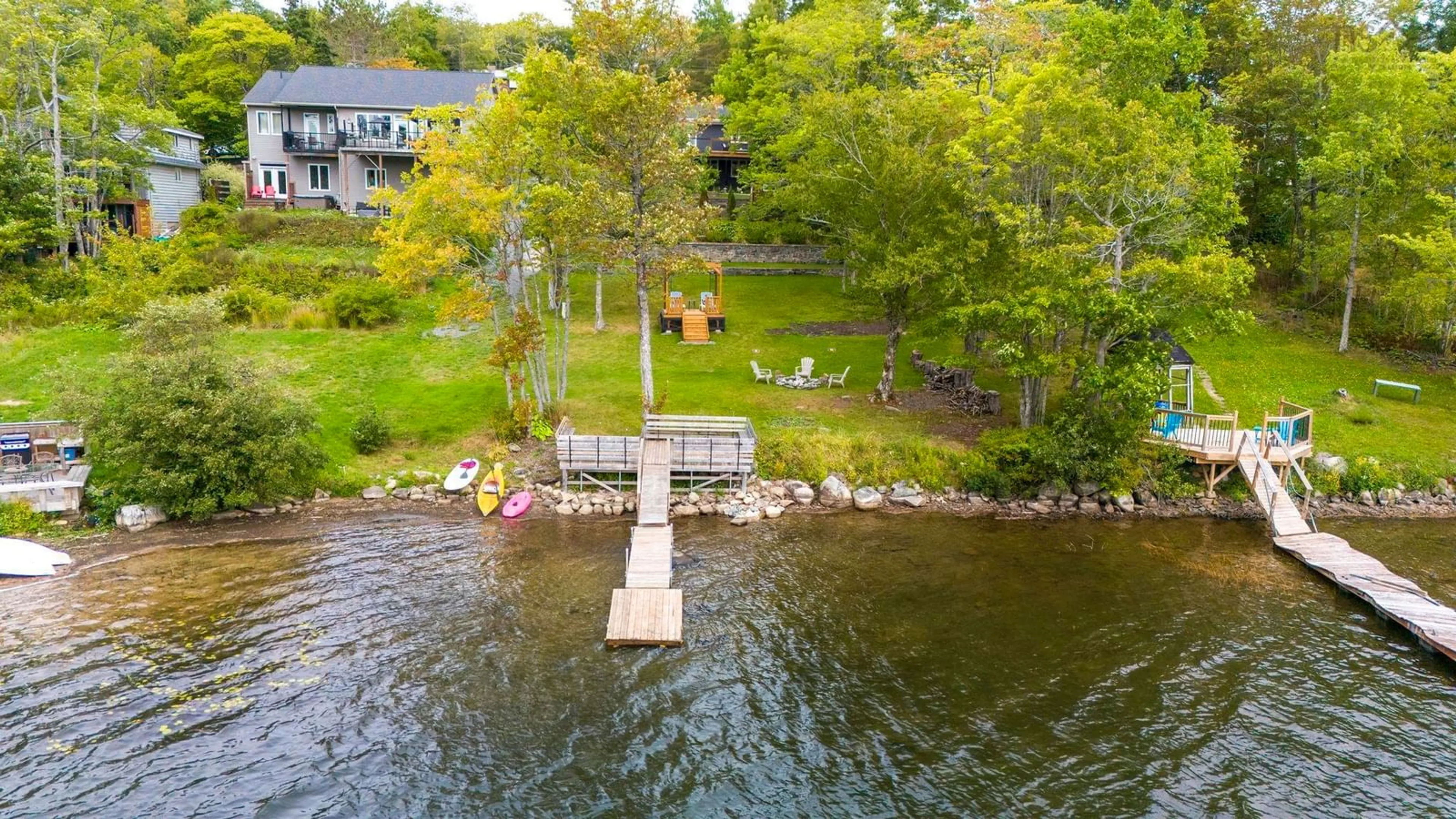 A pic from outside/outdoor area/front of a property/back of a property/a pic from drone, water/lake/river/ocean view for 565 Lakeview Ave, Middle Sackville Nova Scotia B4E 3B8