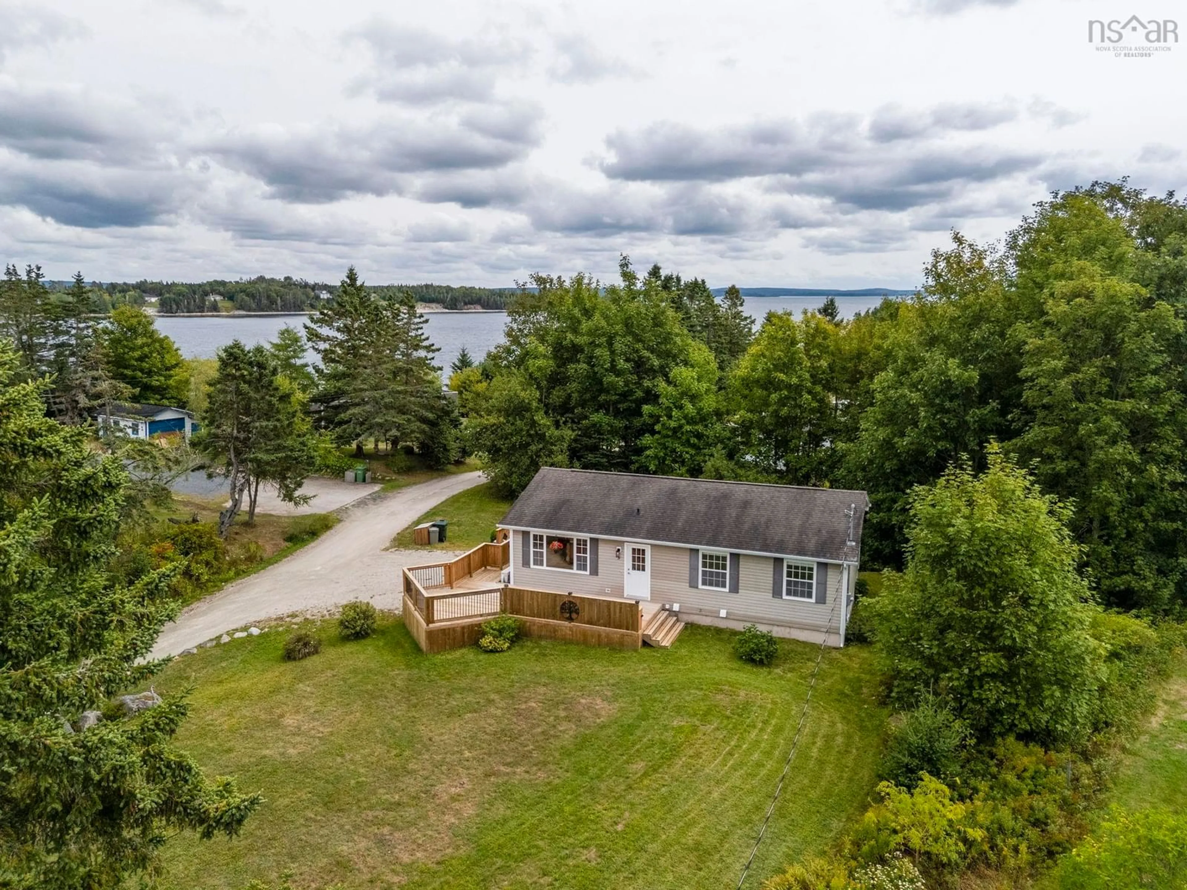 A pic from outside/outdoor area/front of a property/back of a property/a pic from drone, water/lake/river/ocean view for 3 Bayview Lane, Queensland Nova Scotia B0J 1T0