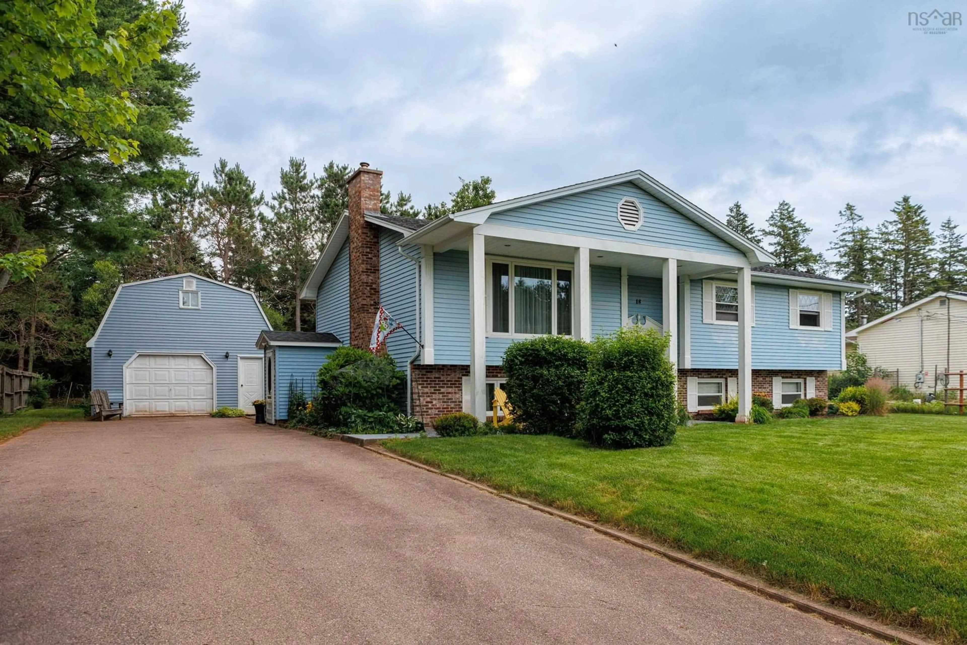 Home with vinyl exterior material, street for 18 Tamarack Dr, Valley Nova Scotia B6L 2V9