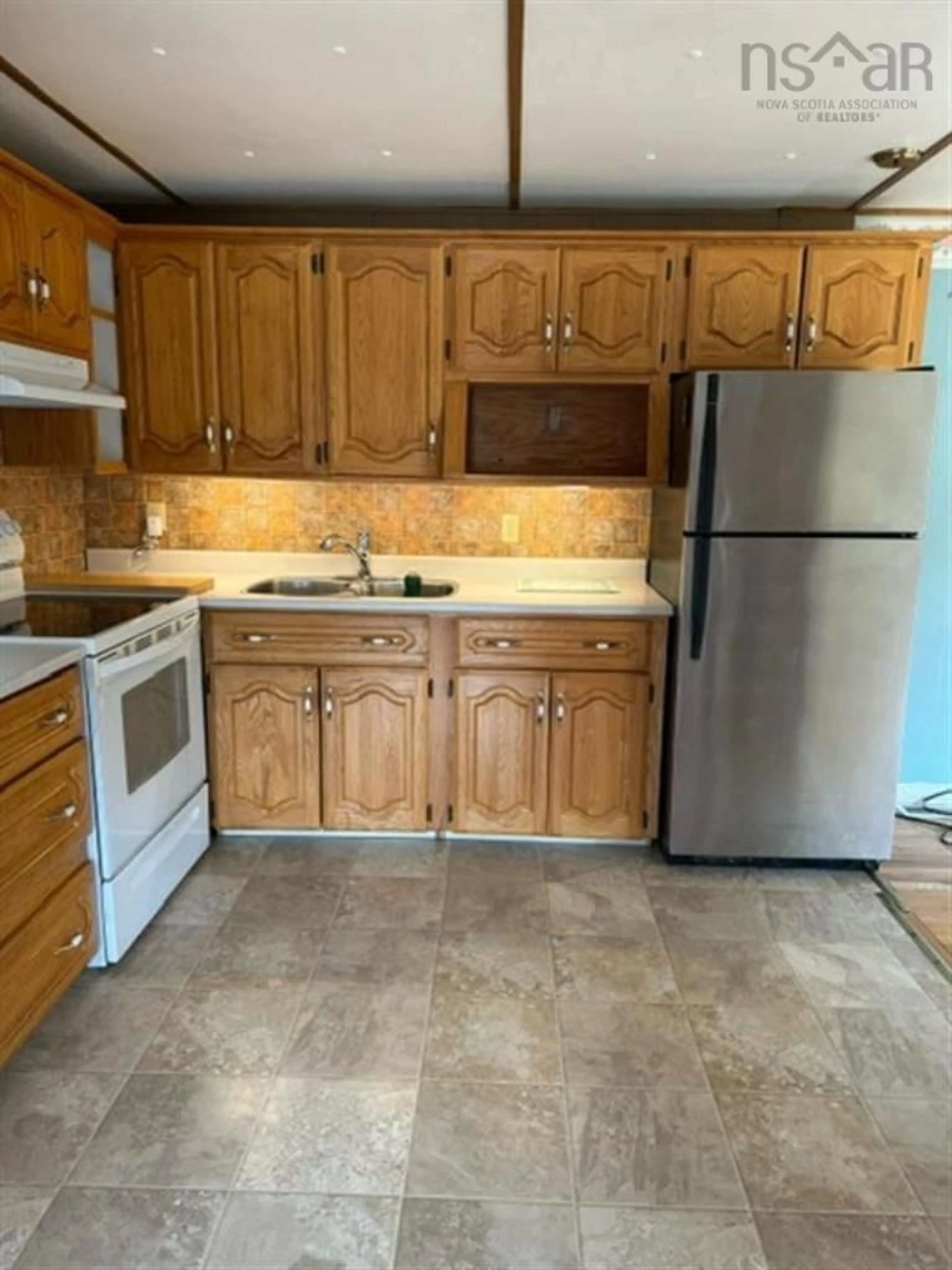 Standard kitchen, ceramic/tile floor for 488 Highway 247, Grande Greve Nova Scotia B0E 3B0