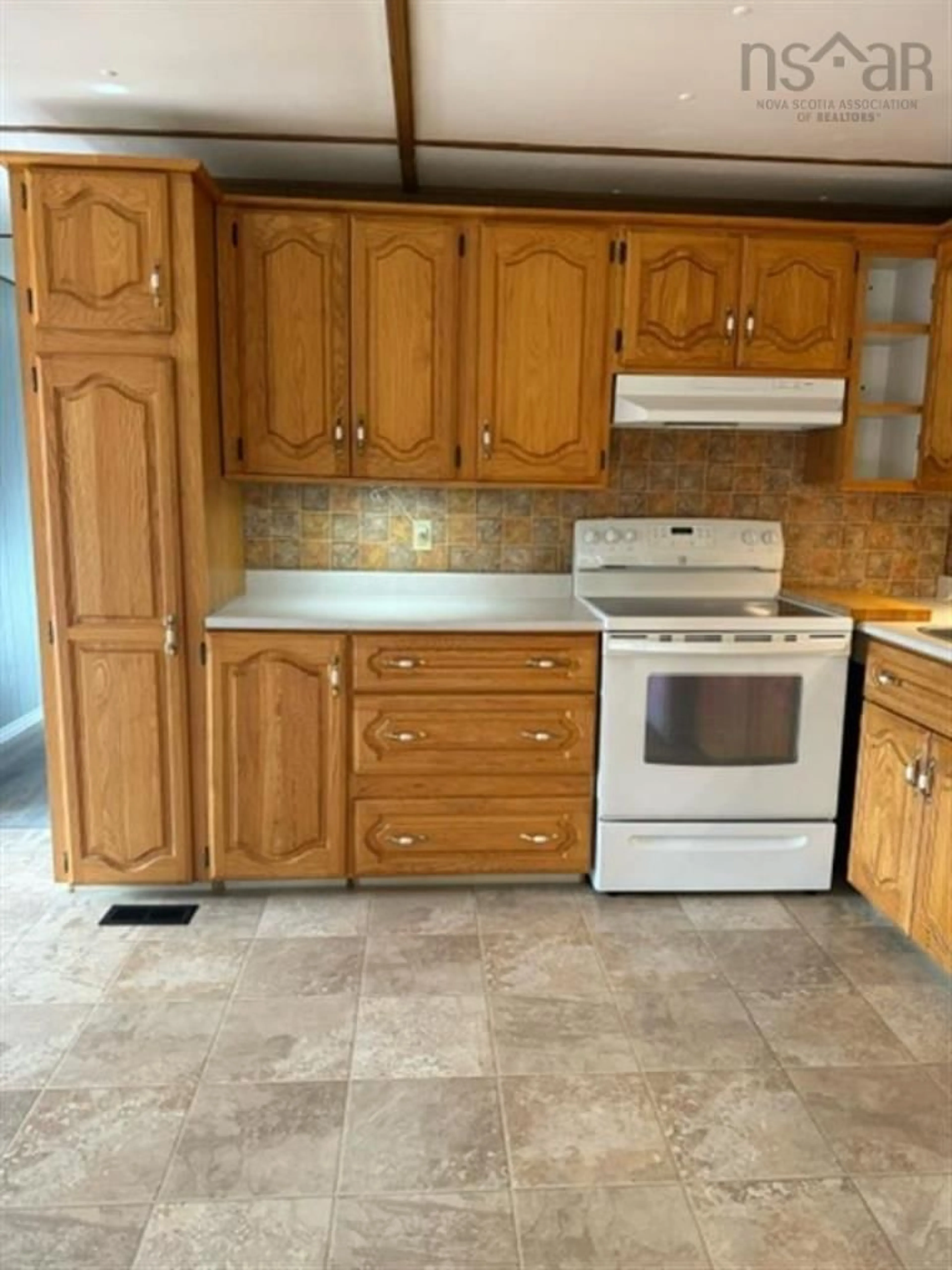 Standard kitchen, ceramic/tile floor for 488 Highway 247, Grande Greve Nova Scotia B0E 3B0