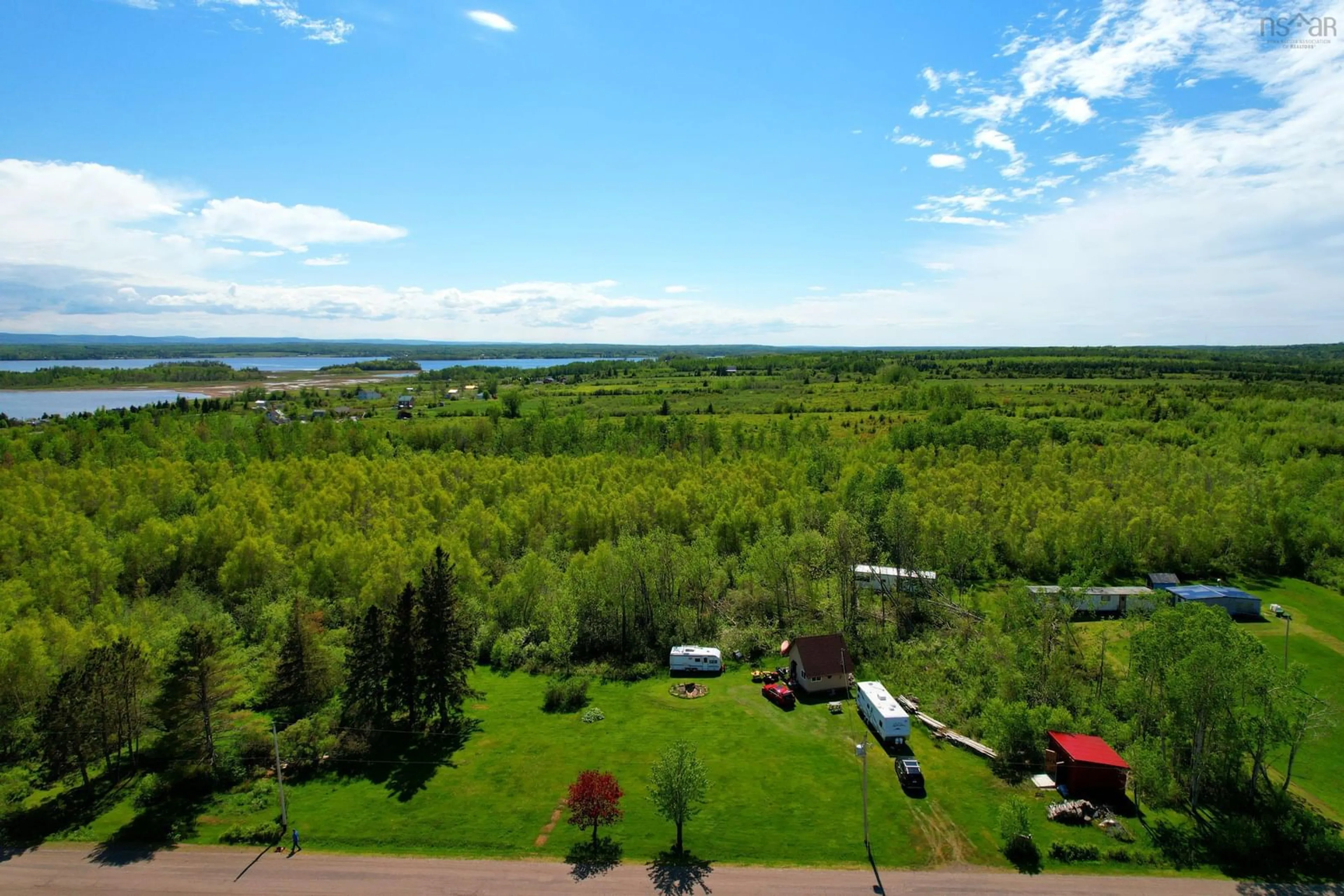 A pic from outside/outdoor area/front of a property/back of a property/a pic from drone, water/lake/river/ocean view for 87 Purdy Loop, Malagash Centre Nova Scotia B0K 1E0