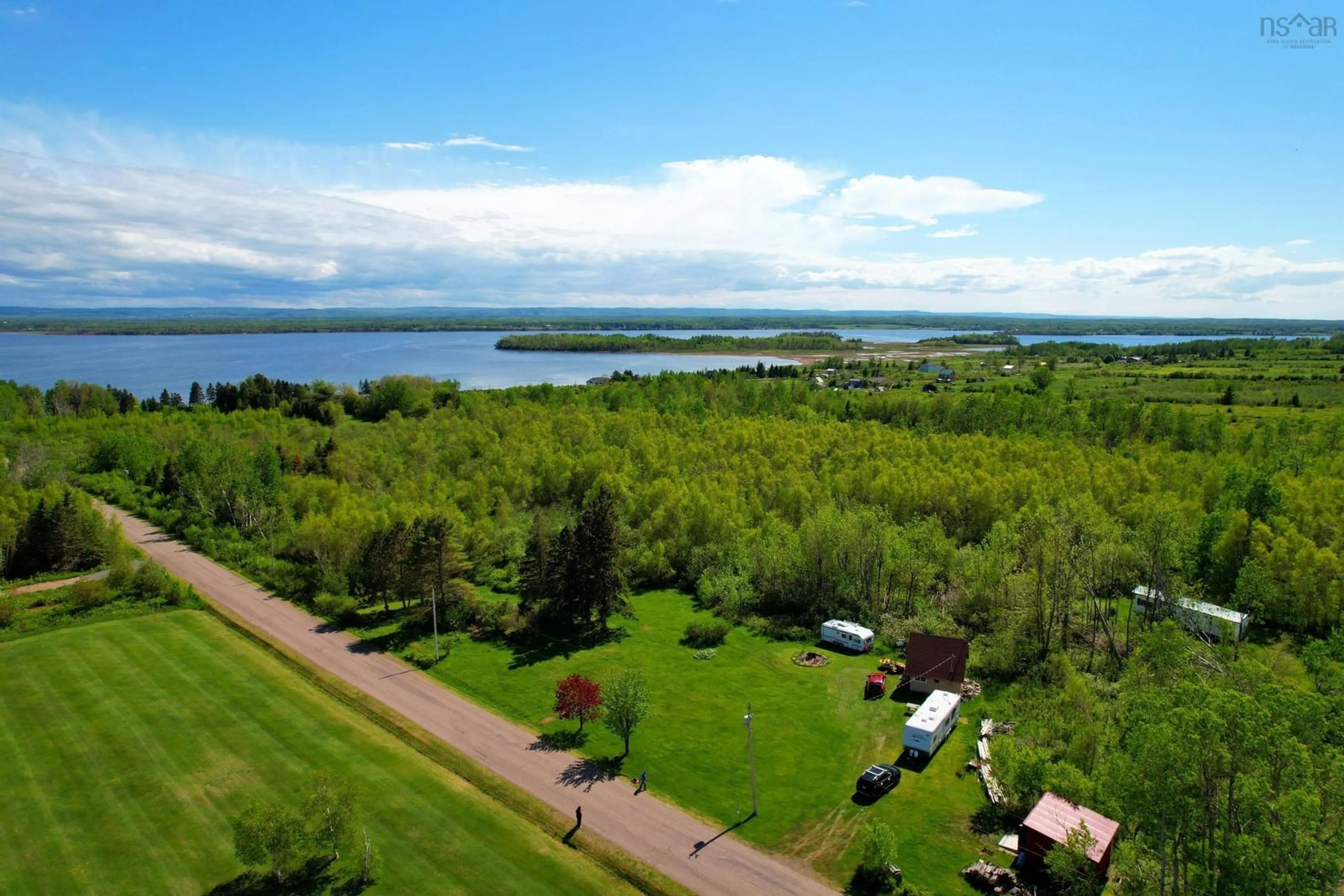 A pic from outside/outdoor area/front of a property/back of a property/a pic from drone, water/lake/river/ocean view for 87 Purdy Loop, Malagash Centre Nova Scotia B0K 1E0