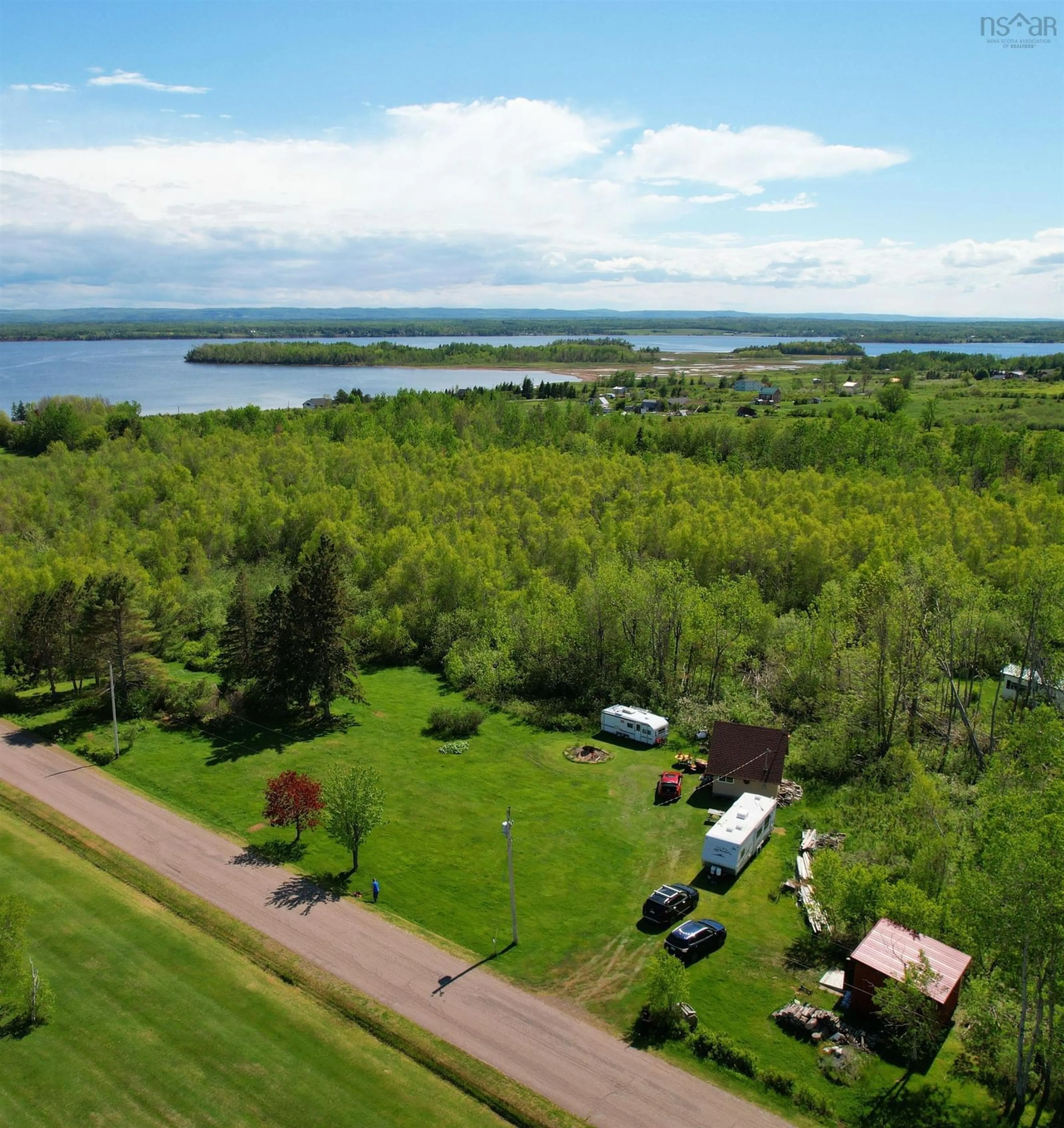 A pic from outside/outdoor area/front of a property/back of a property/a pic from drone, water/lake/river/ocean view for 87 Purdy Loop, Malagash Centre Nova Scotia B0K 1E0