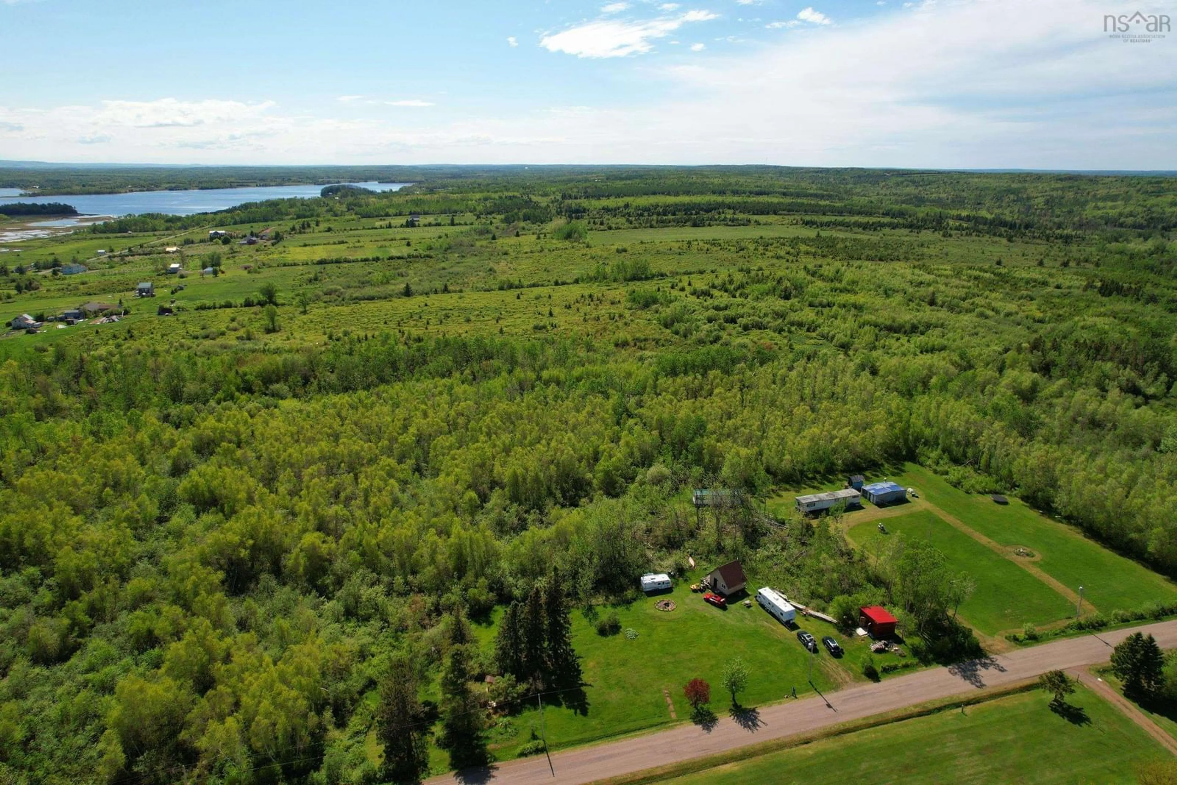A pic from outside/outdoor area/front of a property/back of a property/a pic from drone, water/lake/river/ocean view for 87 Purdy Loop, Malagash Centre Nova Scotia B0K 1E0