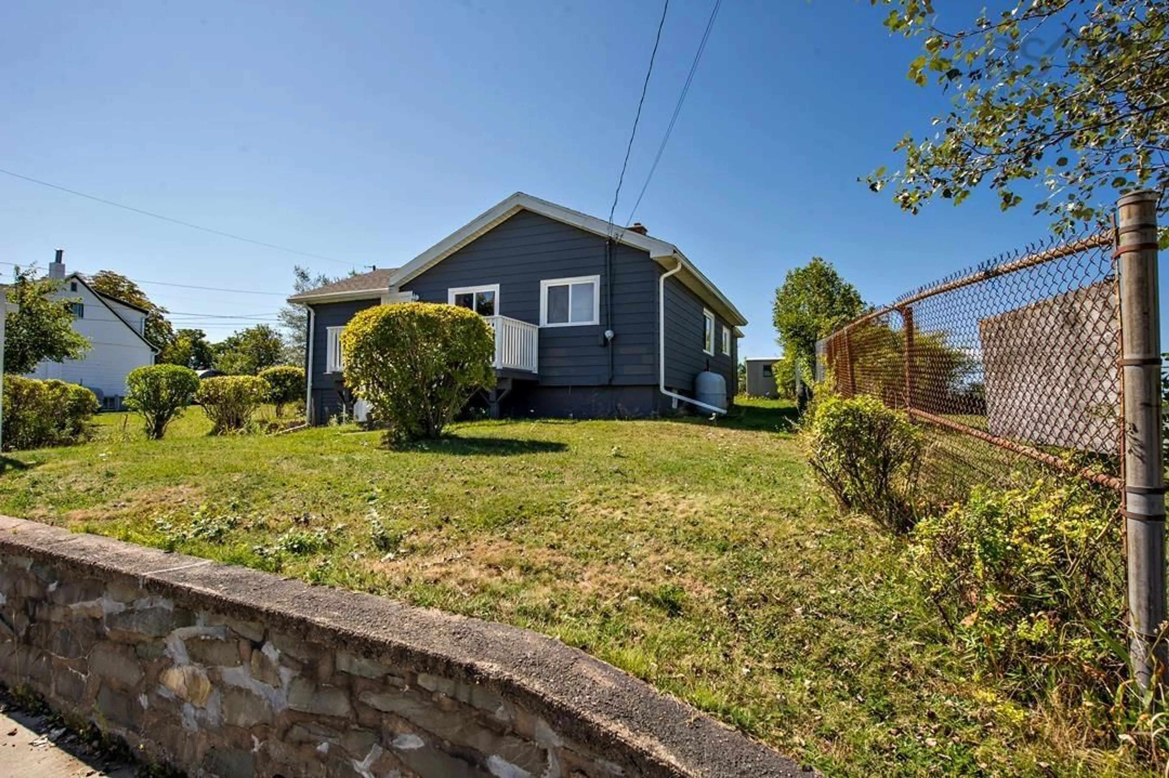 A pic from outside/outdoor area/front of a property/back of a property/a pic from drone, street for 1395 Main Rd, Eastern Passage Nova Scotia B3G 3E9