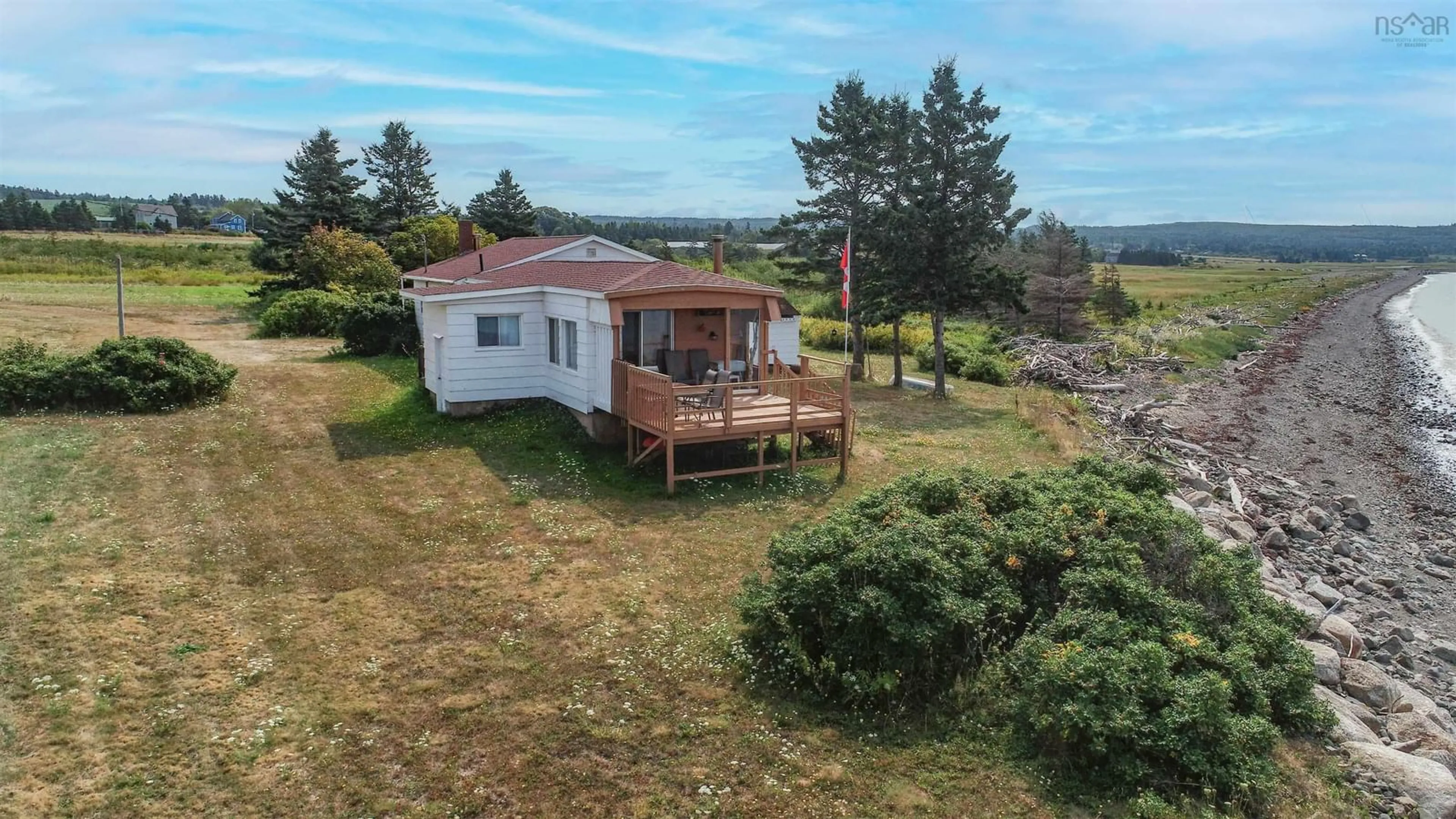 A pic from outside/outdoor area/front of a property/back of a property/a pic from drone, water/lake/river/ocean view for 1472 Cape Split Rd Rd, Scots Bay Nova Scotia B0P 1H0