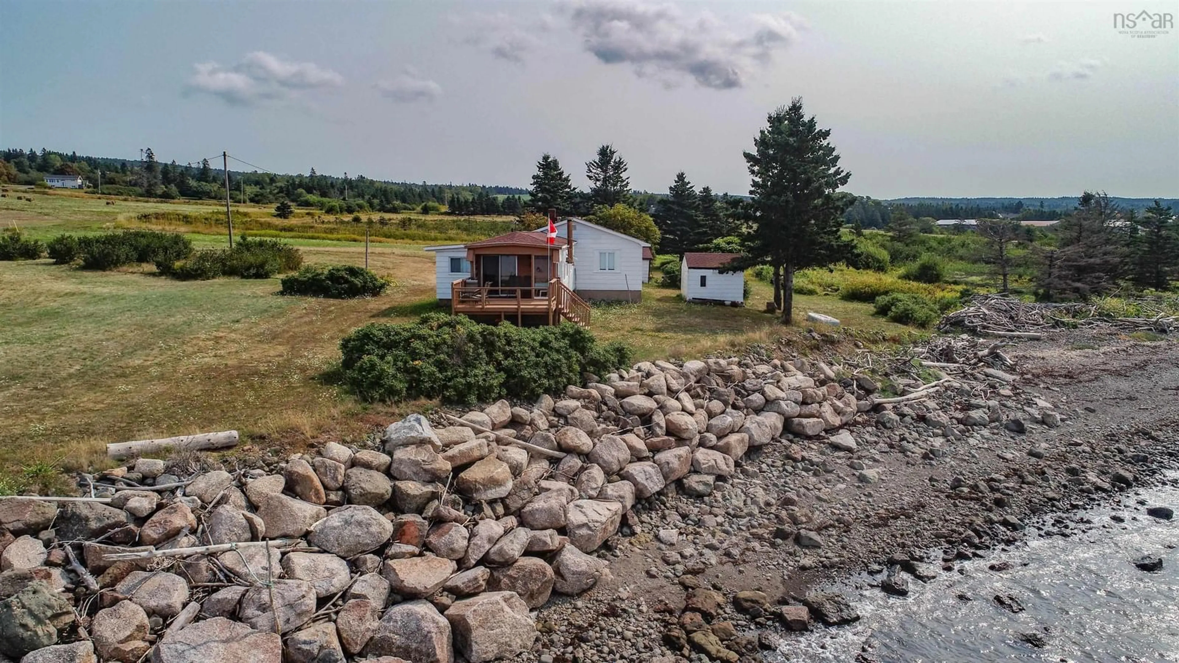 A pic from outside/outdoor area/front of a property/back of a property/a pic from drone, water/lake/river/ocean view for 1472 Cape Split Rd Rd, Scots Bay Nova Scotia B0P 1H0