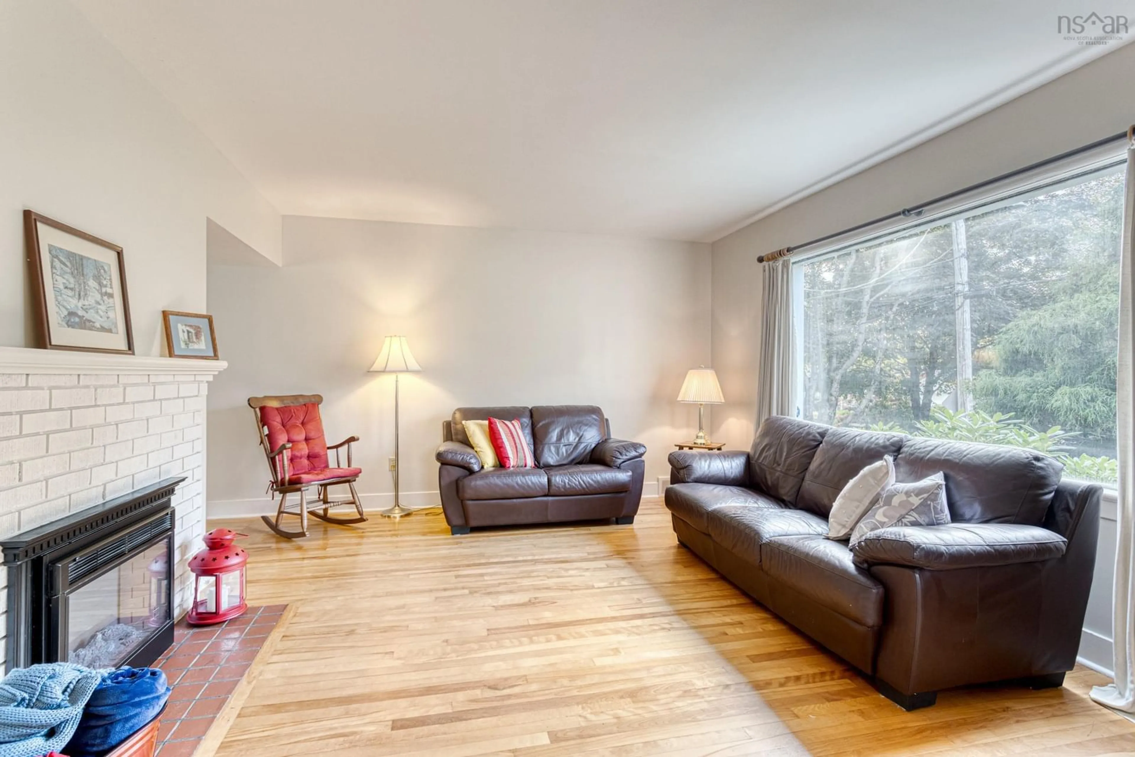 Living room with furniture, wood/laminate floor for 53 Milverton Rd, Dartmouth Nova Scotia B2Y 0A8