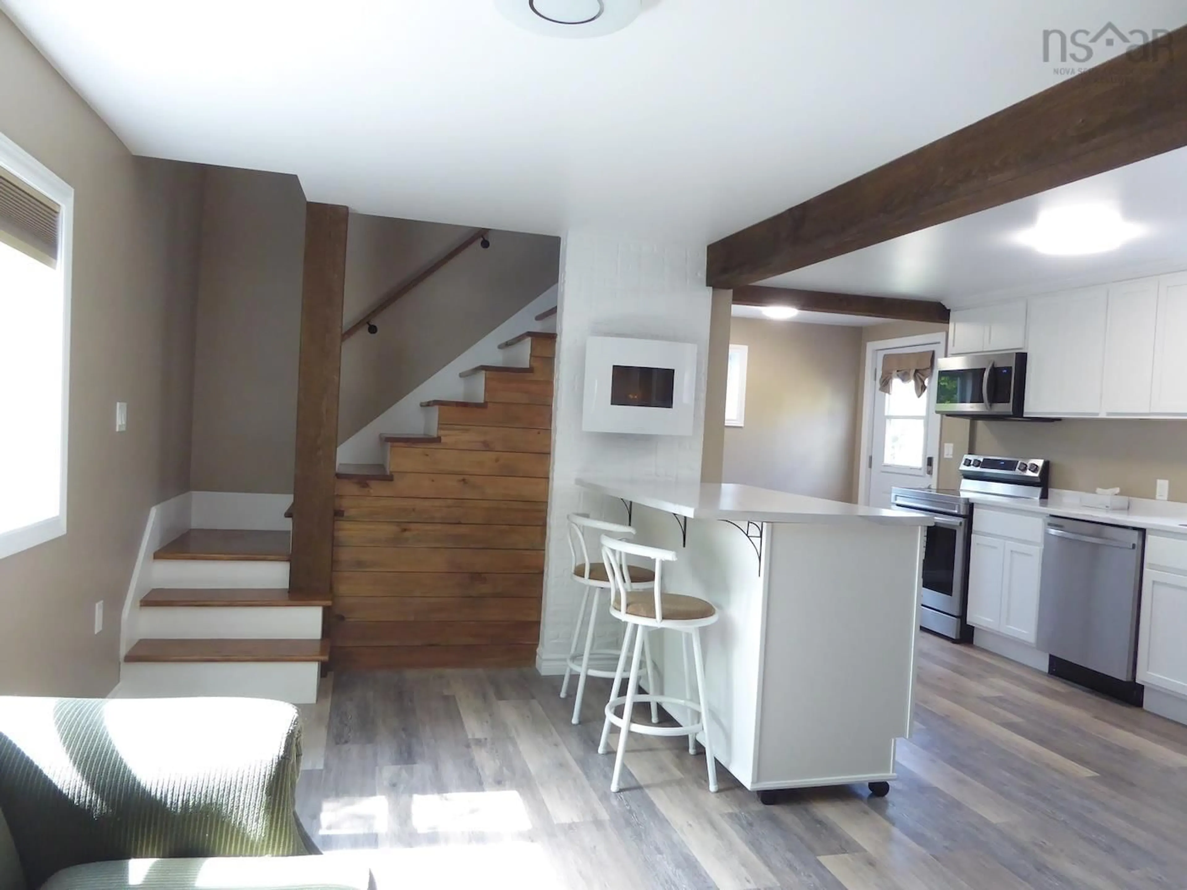 Open concept kitchen, wood/laminate floor for 21 First St, Trenton Nova Scotia B0K 1X0