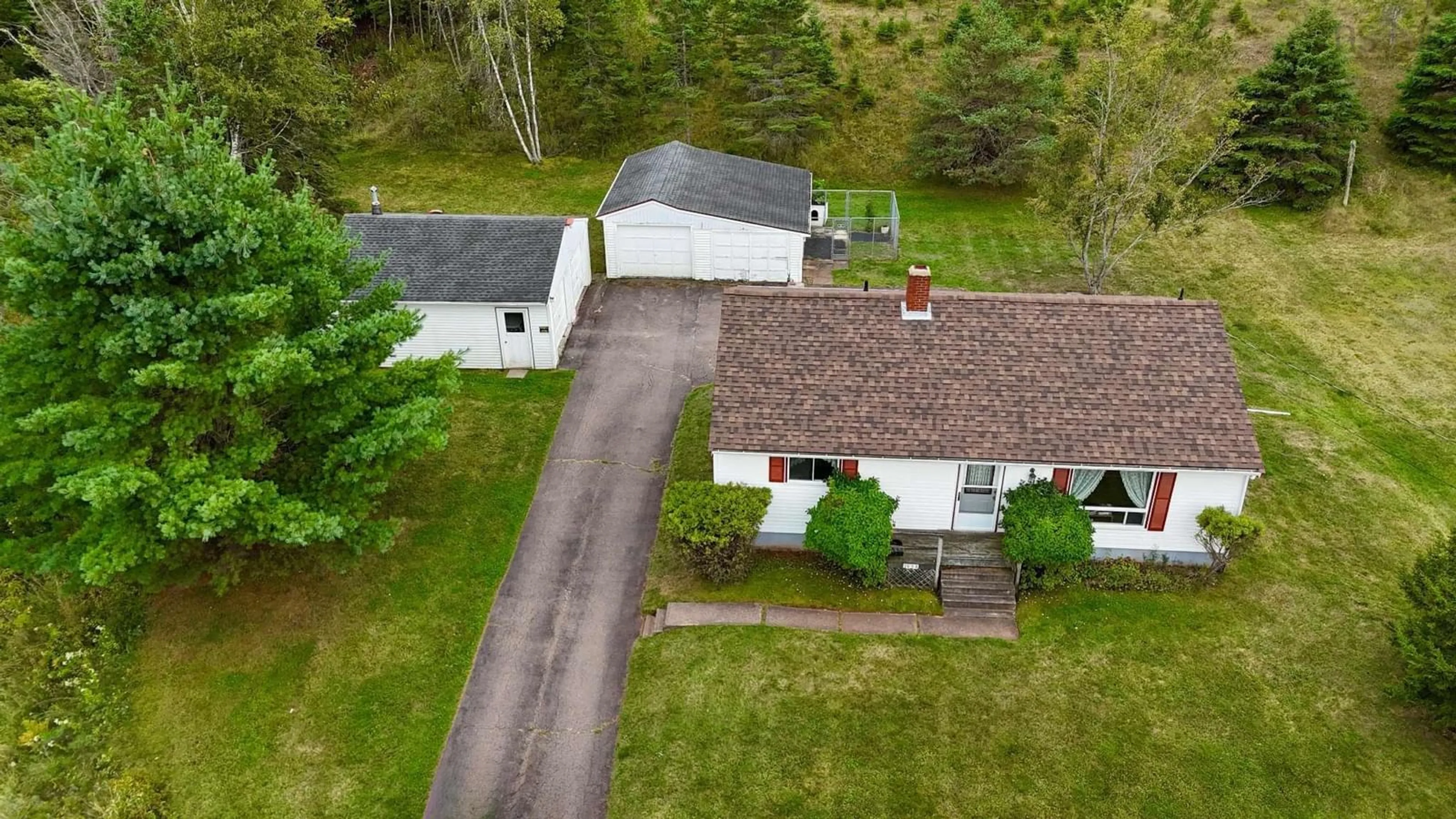 A pic from outside/outdoor area/front of a property/back of a property/a pic from drone, street for 1498 East Prince St, Salmon River Nova Scotia B6L 4C8
