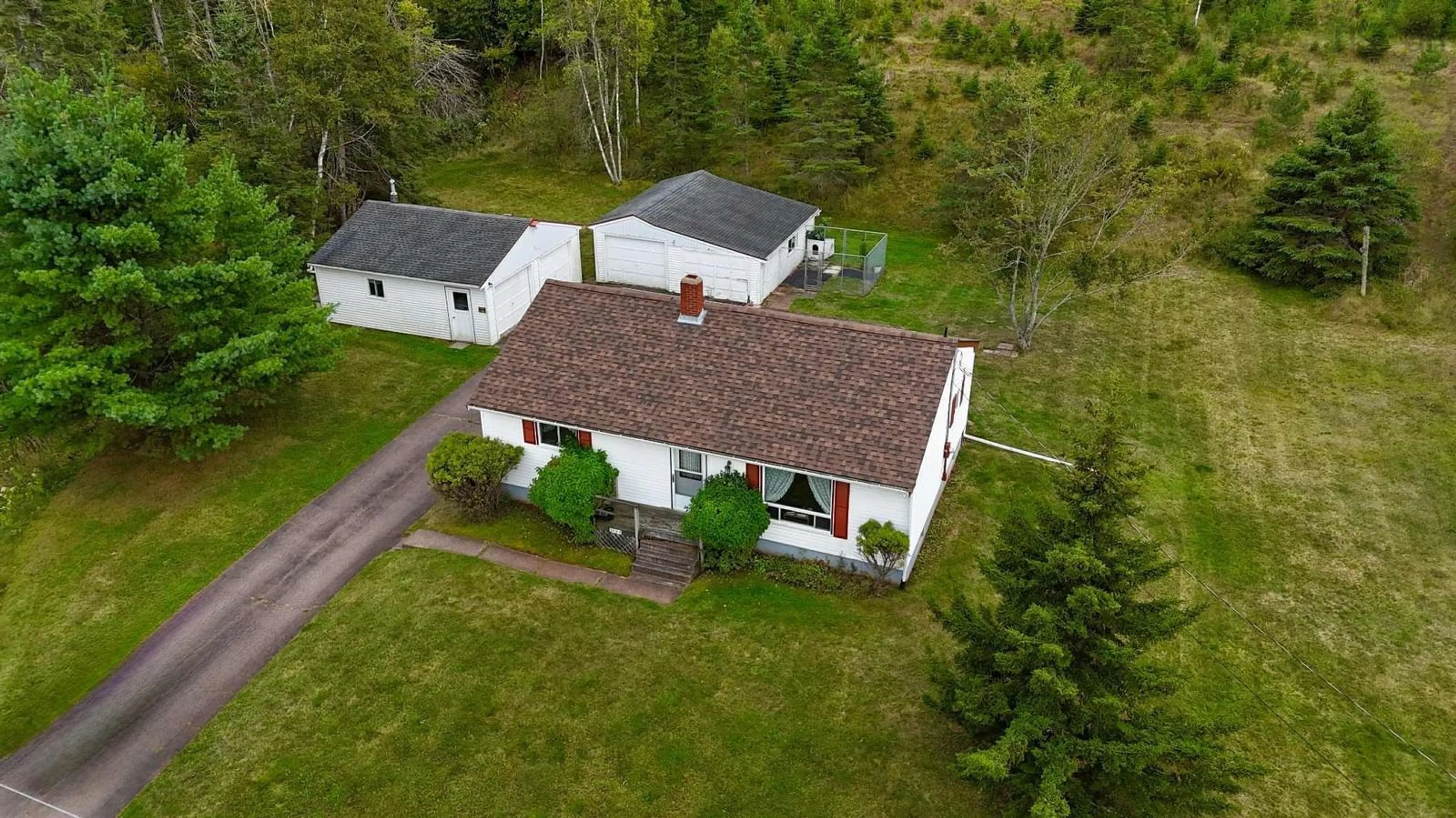 A pic from outside/outdoor area/front of a property/back of a property/a pic from drone, street for 1498 East Prince St, Salmon River Nova Scotia B6L 4C8