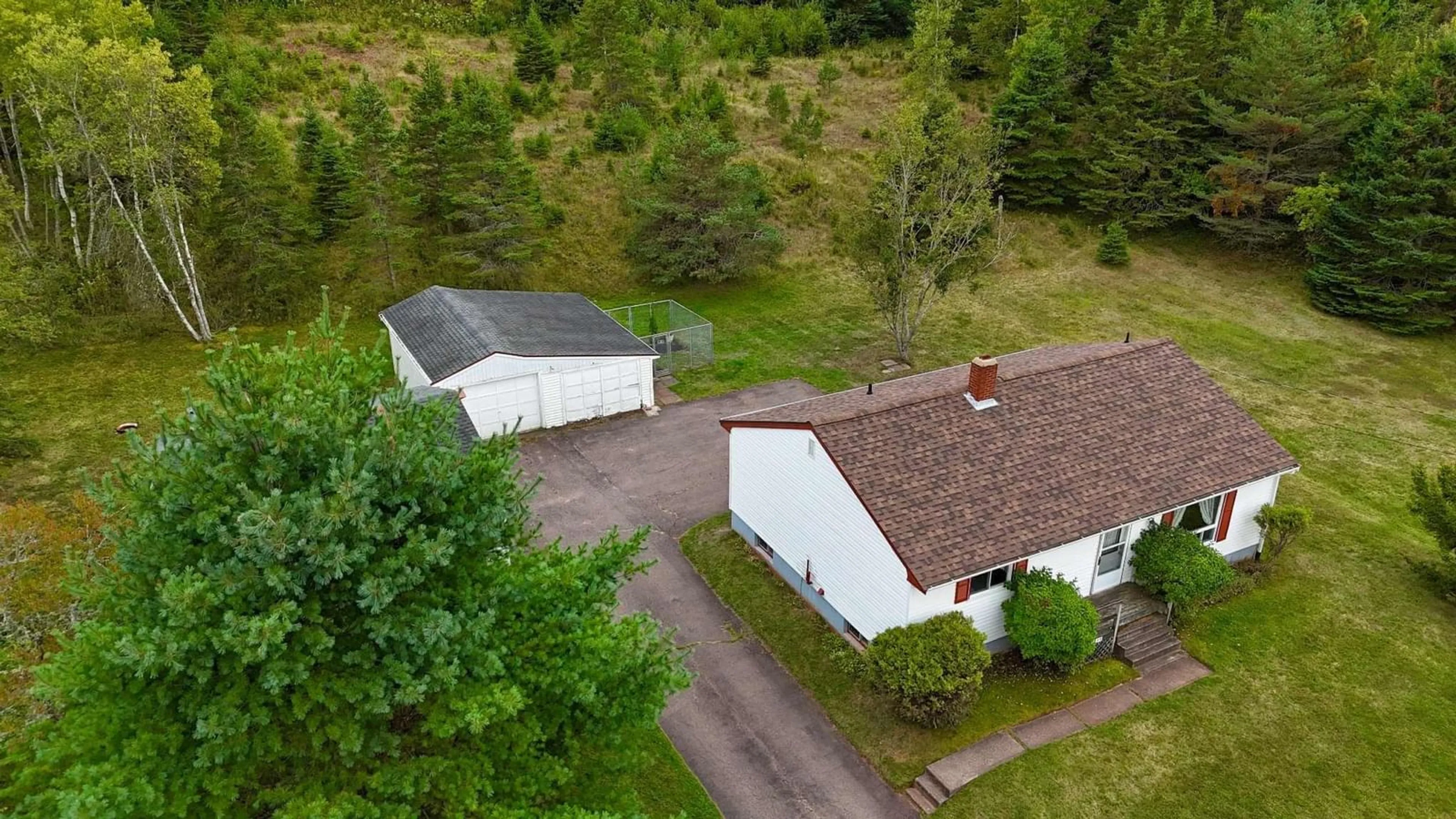 A pic from outside/outdoor area/front of a property/back of a property/a pic from drone, building for 1498 East Prince St, Salmon River Nova Scotia B6L 4C8