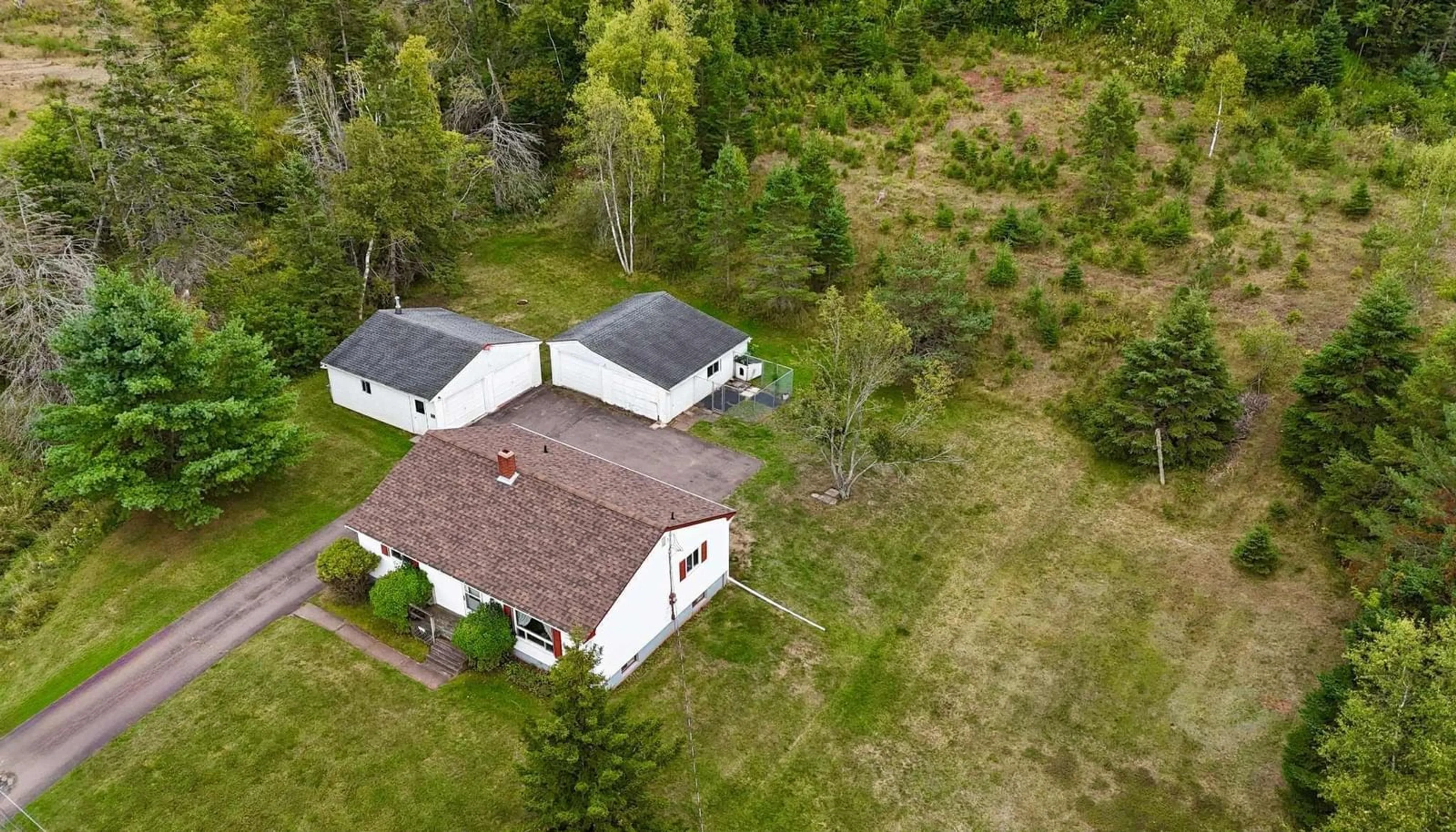 A pic from outside/outdoor area/front of a property/back of a property/a pic from drone, building for 1498 East Prince St, Salmon River Nova Scotia B6L 4C8