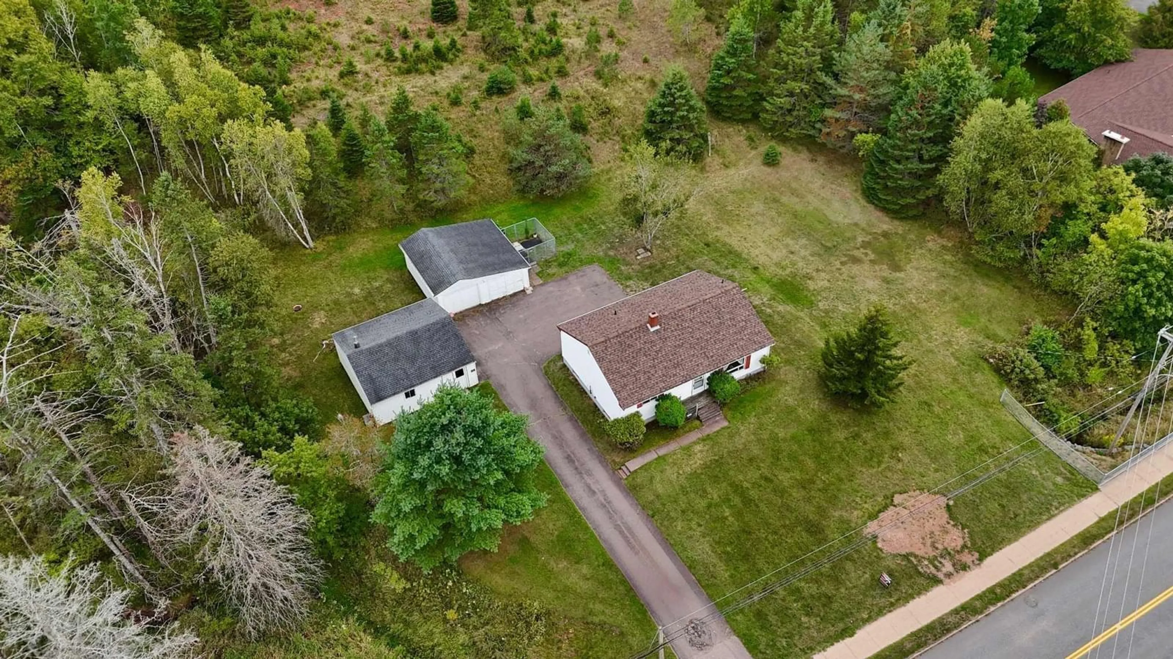 A pic from outside/outdoor area/front of a property/back of a property/a pic from drone, street for 1498 East Prince St, Salmon River Nova Scotia B6L 4C8