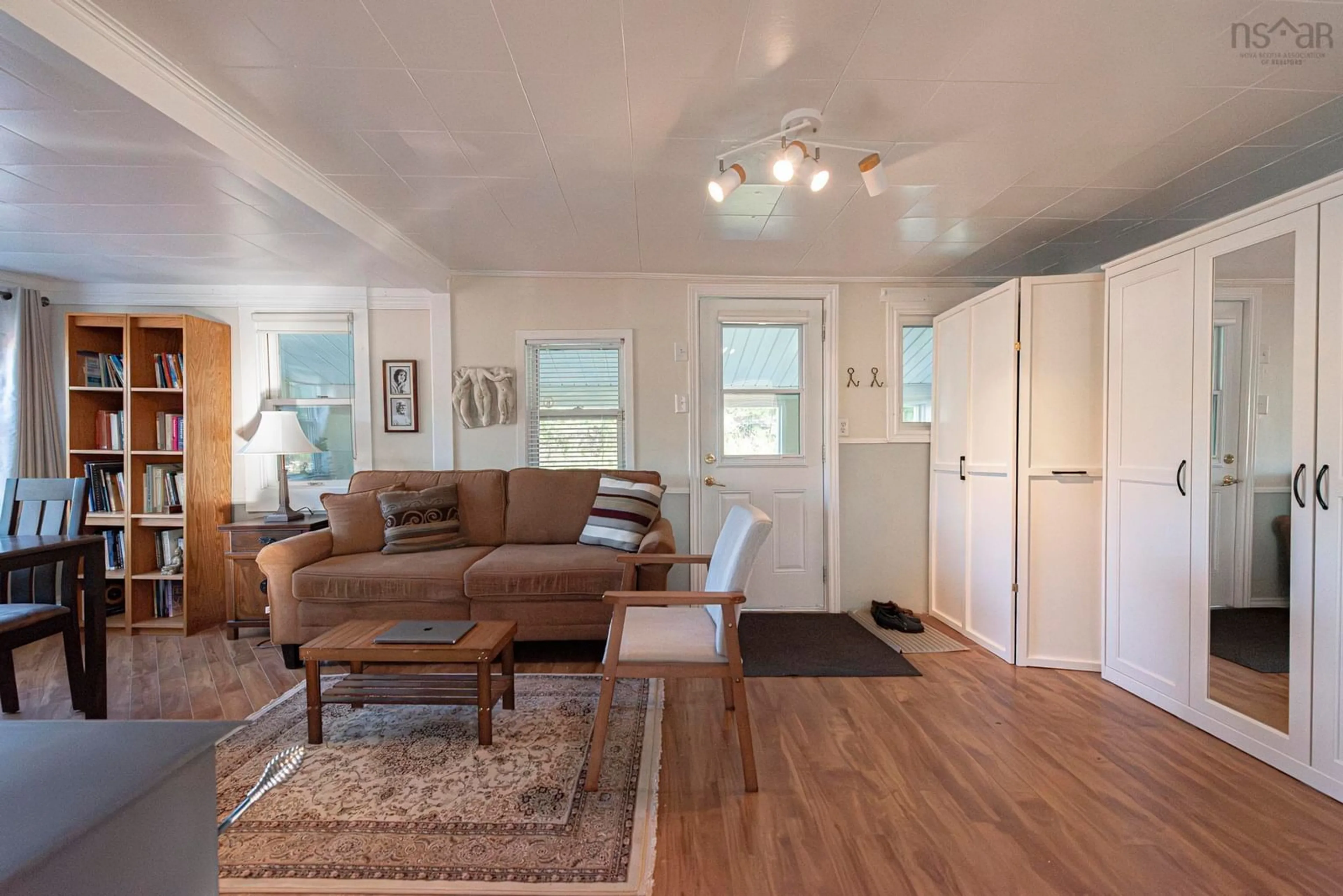 Living room with furniture, wood/laminate floor for 209 Ghana Ave, New Glasgow Nova Scotia B2H 4X2