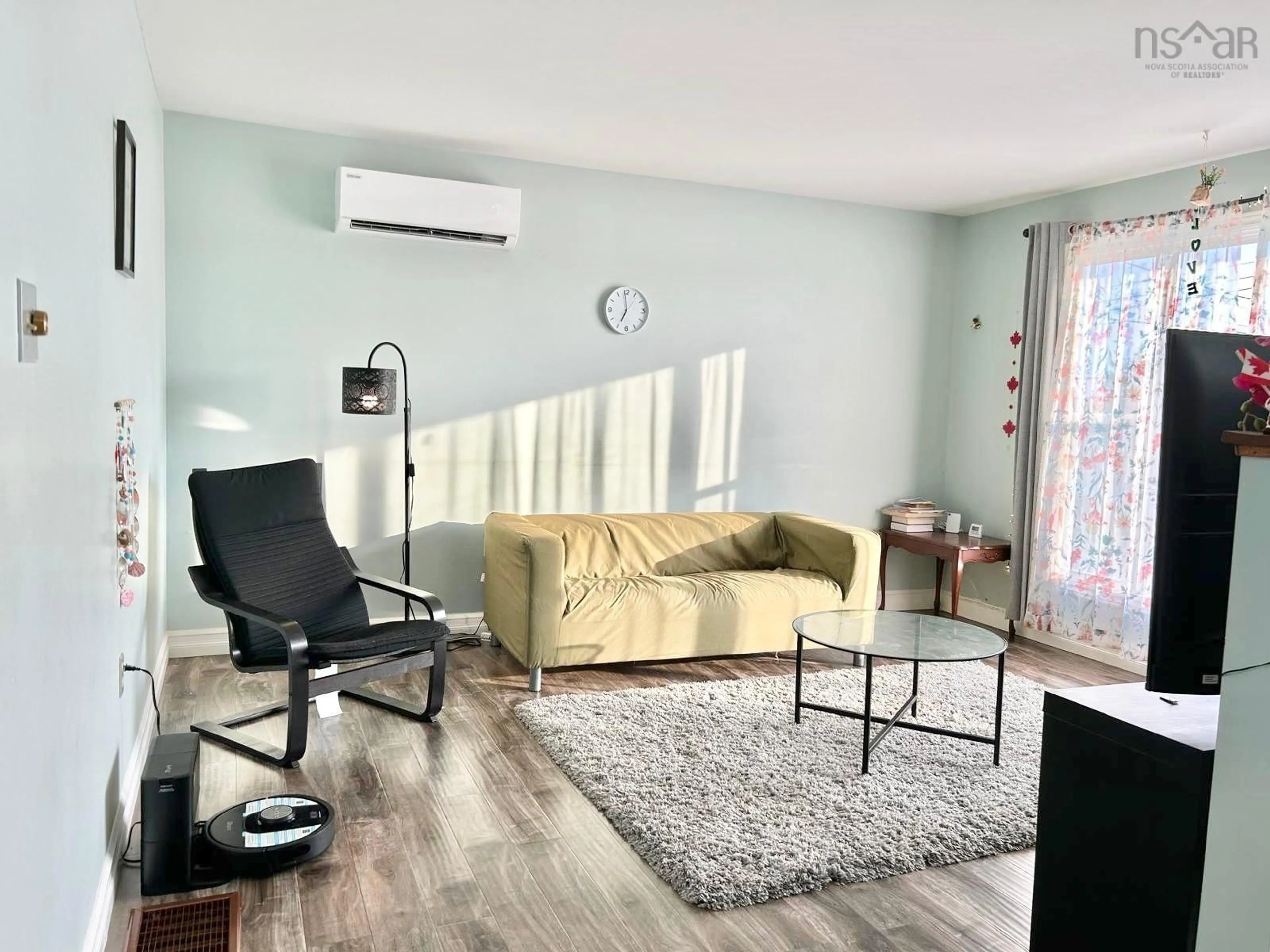 Living room with furniture, wood/laminate floor for 214 Arklow Dr, Dartmouth Nova Scotia B2W 4R6