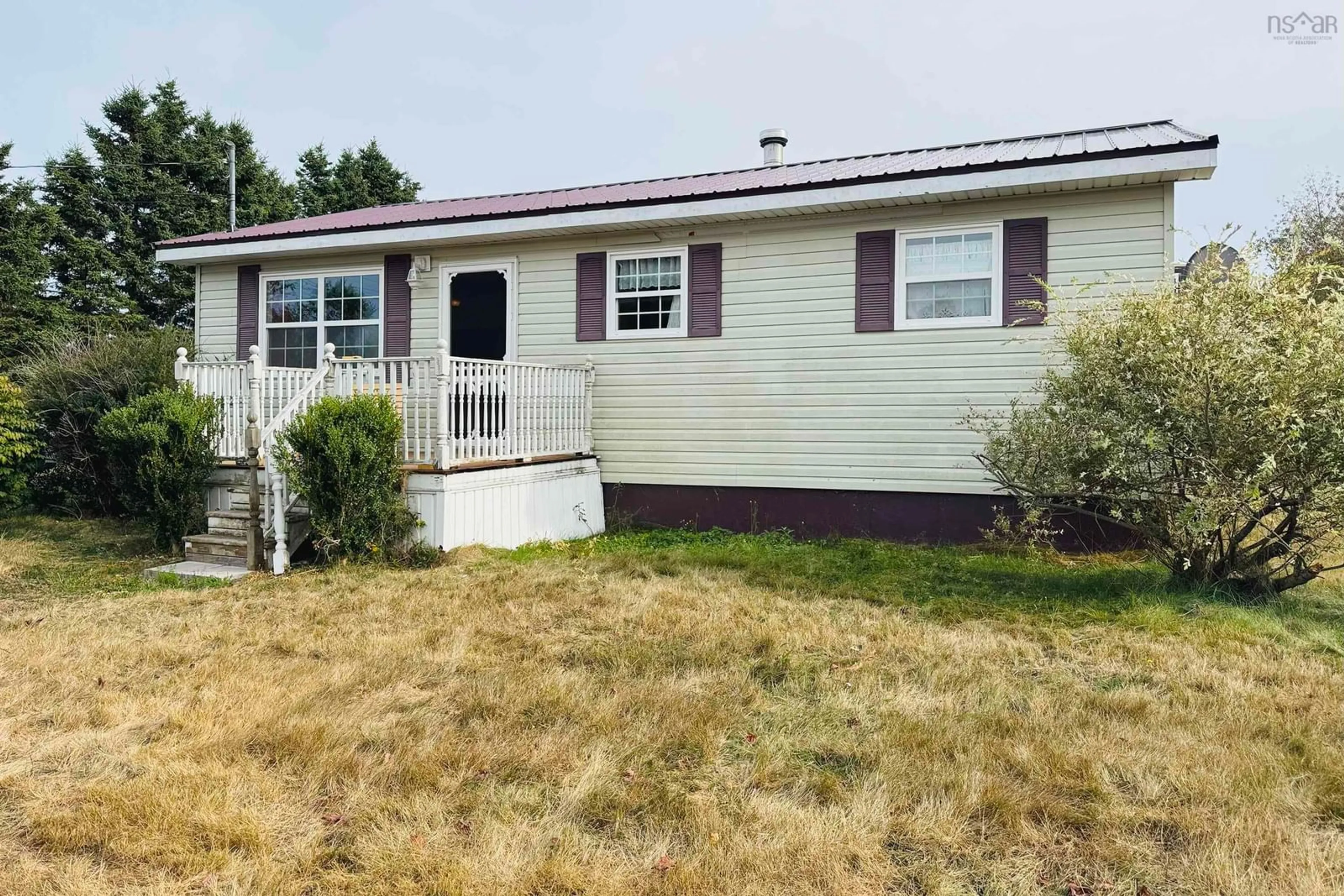 Home with vinyl exterior material, street for 16 Maple Crt, Parrsboro Nova Scotia B0M 1S0