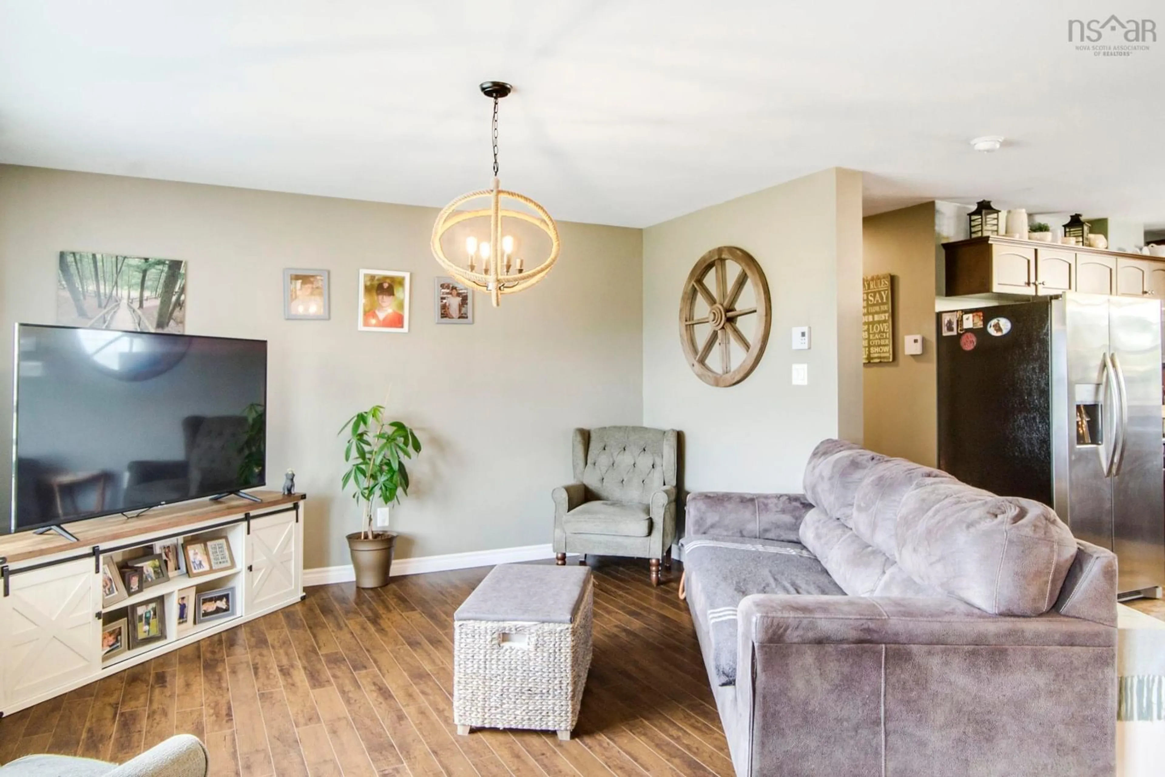 Living room with furniture, wood/laminate floor for 741 Villagedale Rd, Coffinscroft Nova Scotia B0W 1E0