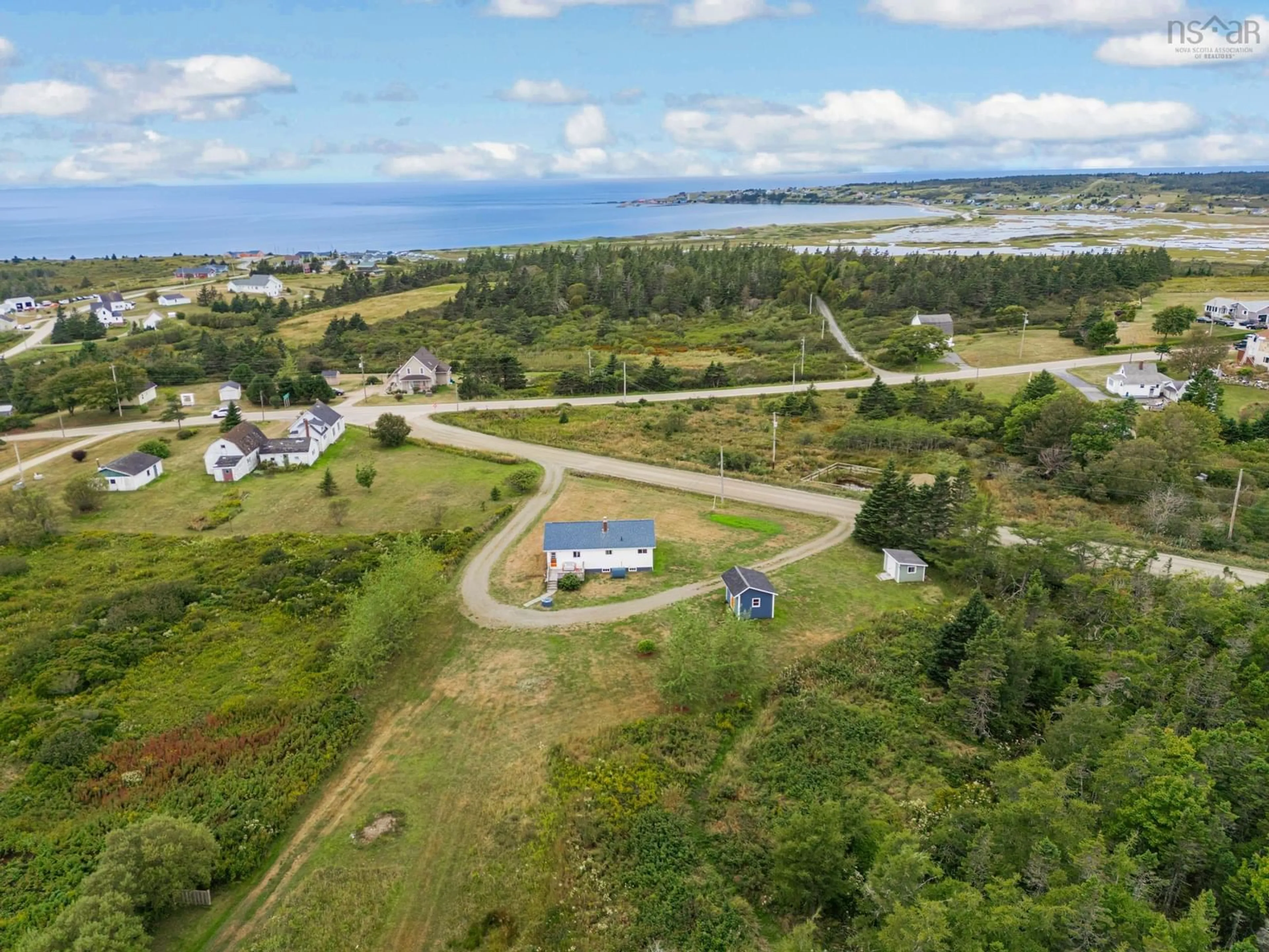 A pic from outside/outdoor area/front of a property/back of a property/a pic from drone, water/lake/river/ocean view for 8 C Boudreau Rd, Mavillette Nova Scotia B5A 5B3