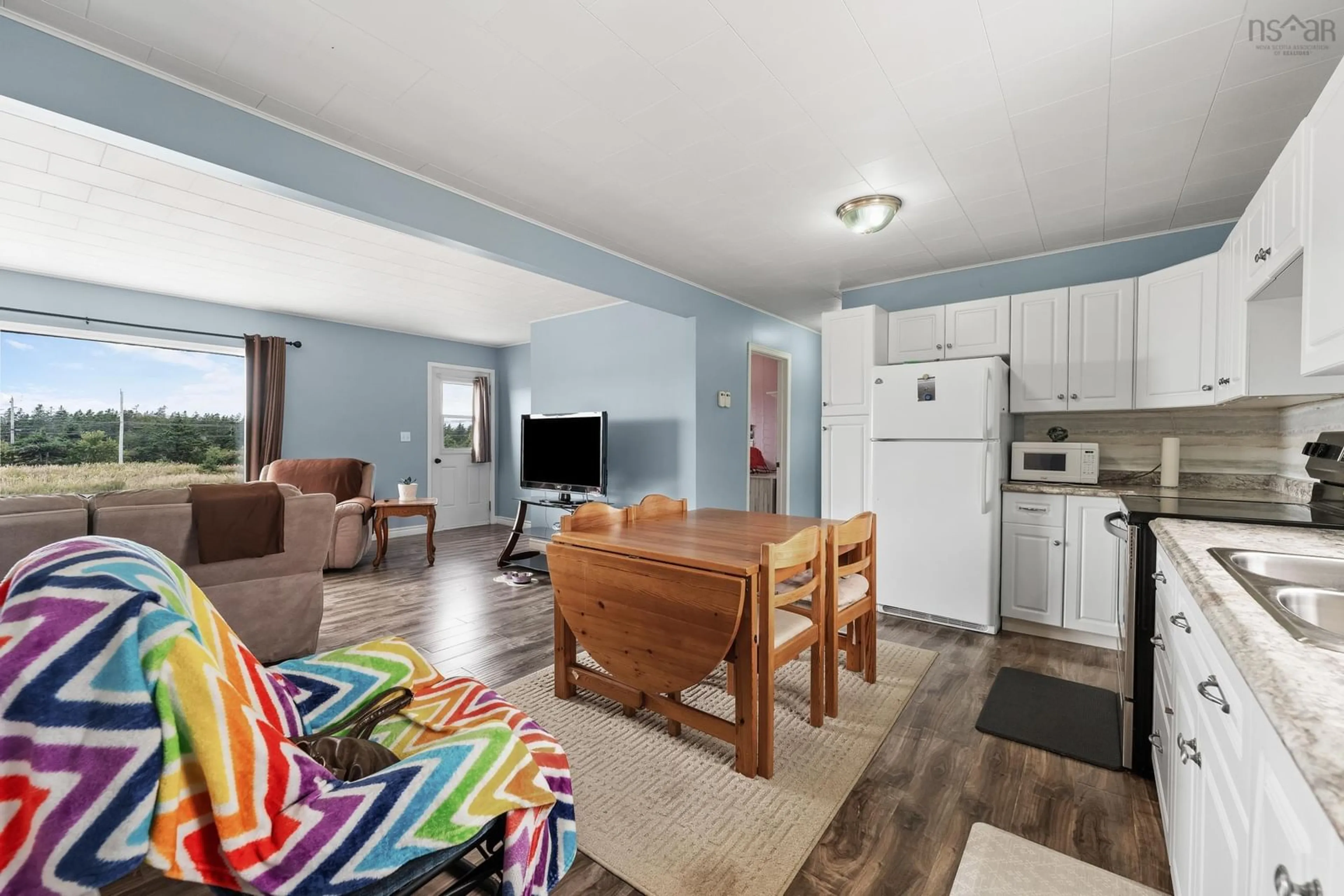 Living room with furniture, unknown for 8 C Boudreau Rd, Mavillette Nova Scotia B5A 5B3