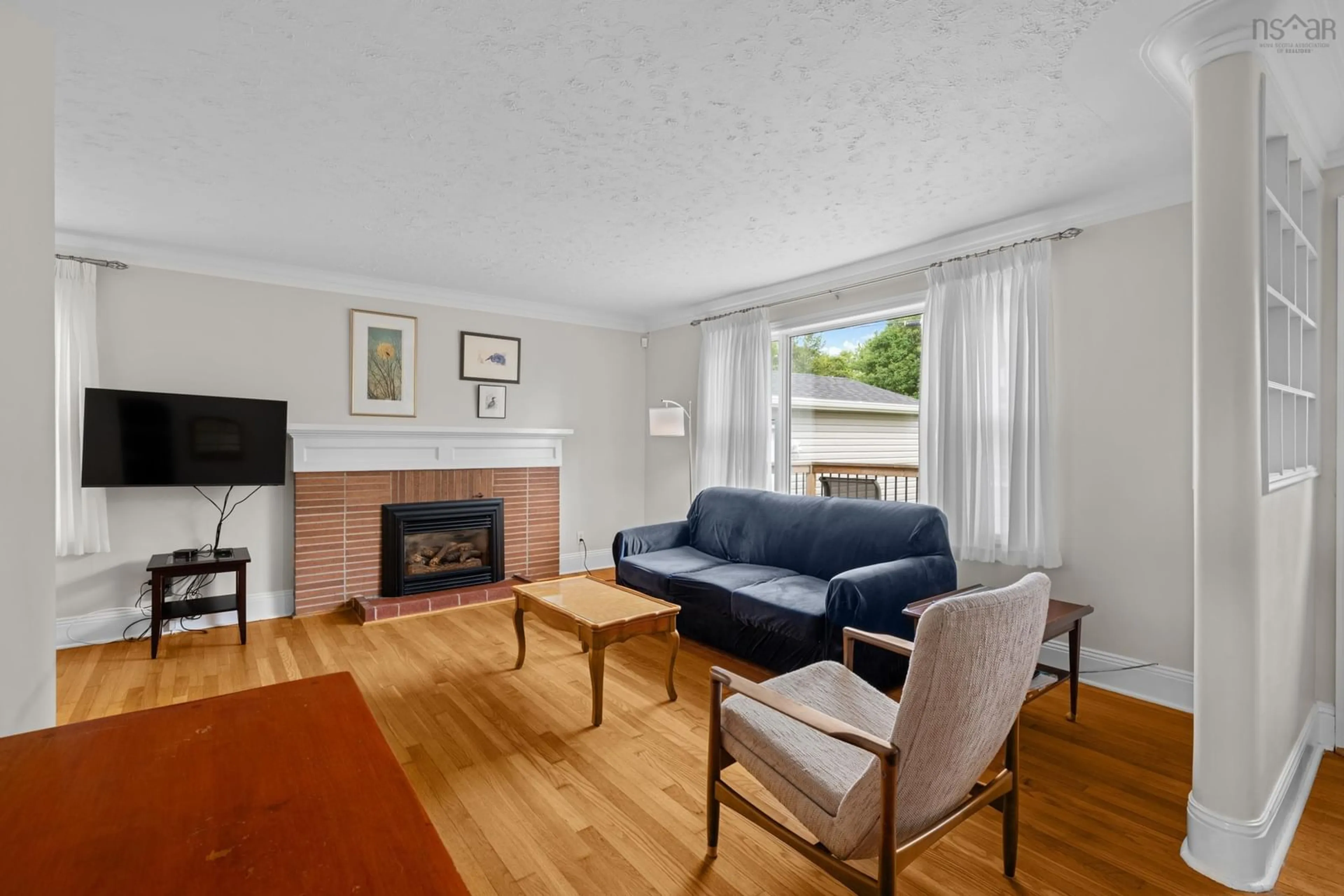 Living room with furniture, wood/laminate floor for 27 Fleming Dr, Halifax Nova Scotia B3P 1A8