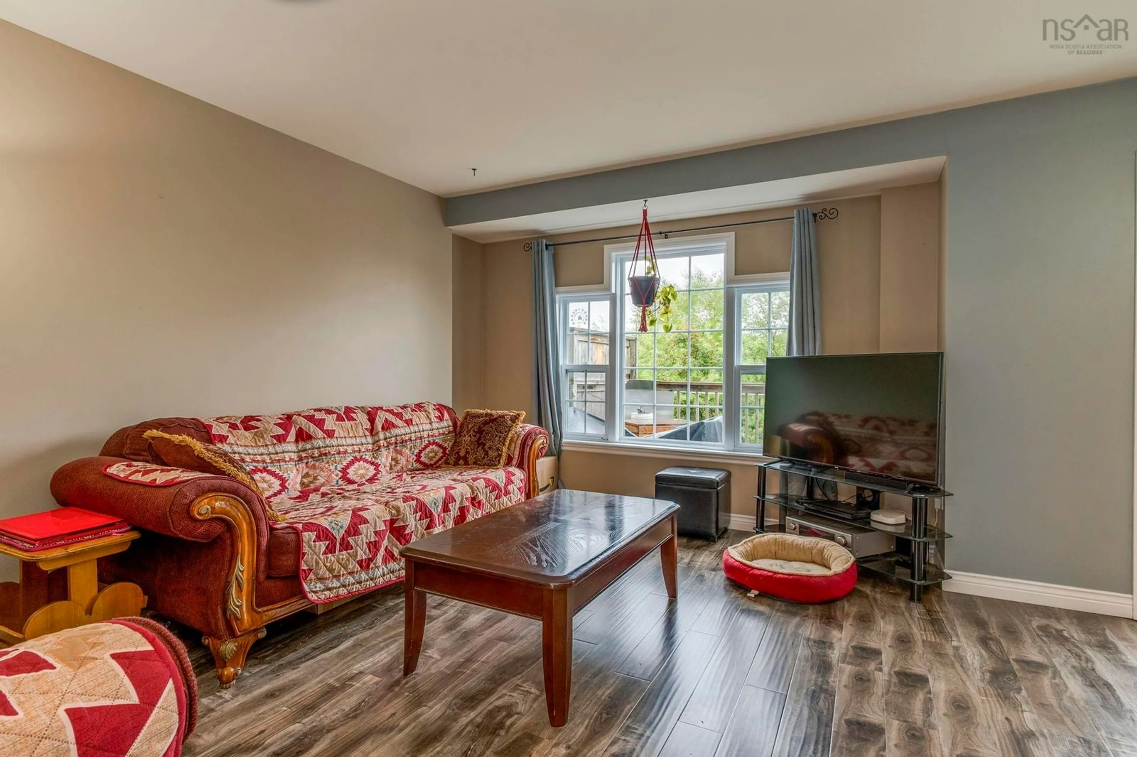 Living room with furniture, wood/laminate floor for 315 Poplar Dr, Cole Harbour Nova Scotia B2W 4K8
