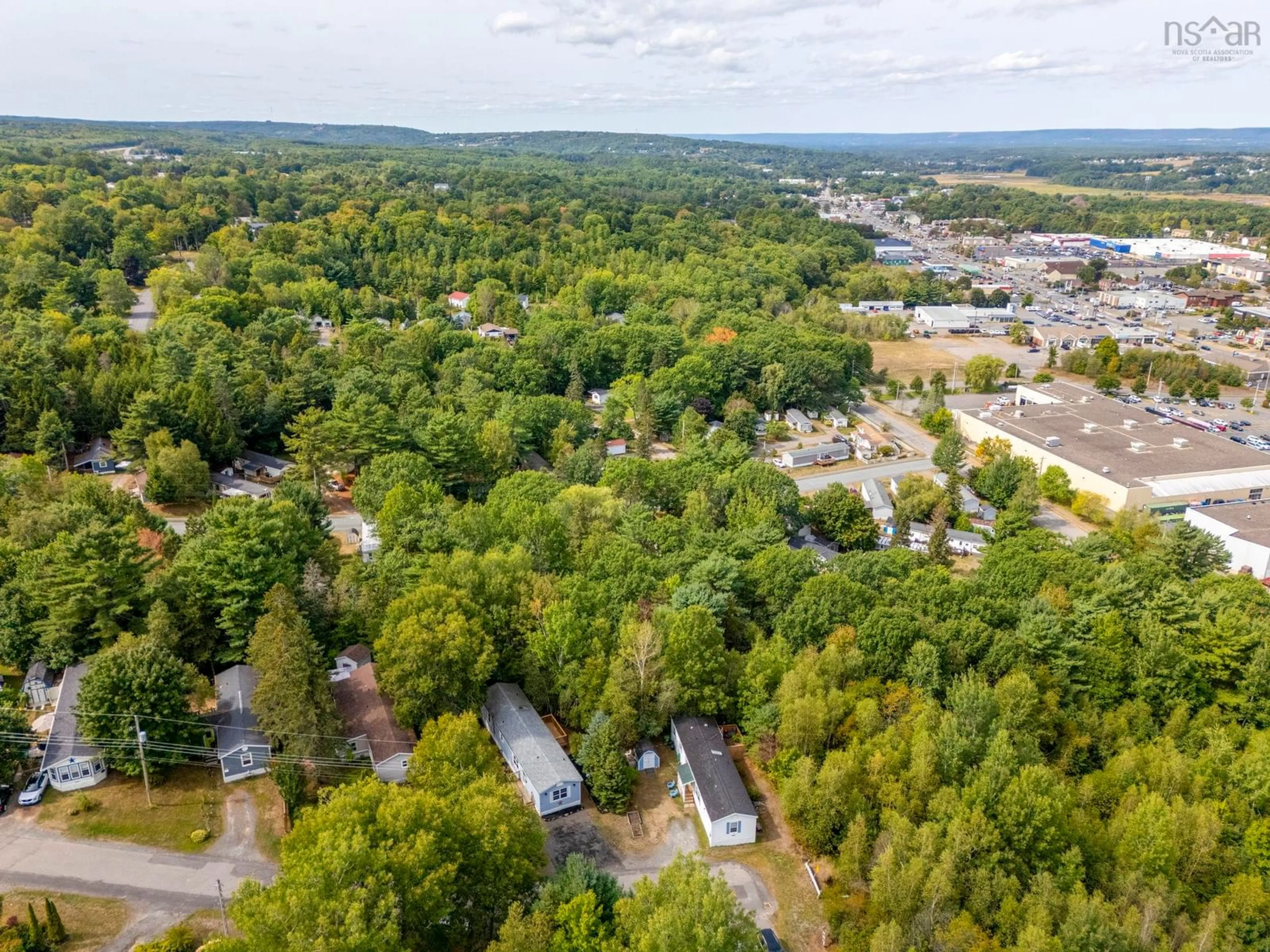 A pic from outside/outdoor area/front of a property/back of a property/a pic from drone, forest/trees view for 31 Pinecrest Dr, New Minas Nova Scotia B4N 4W5