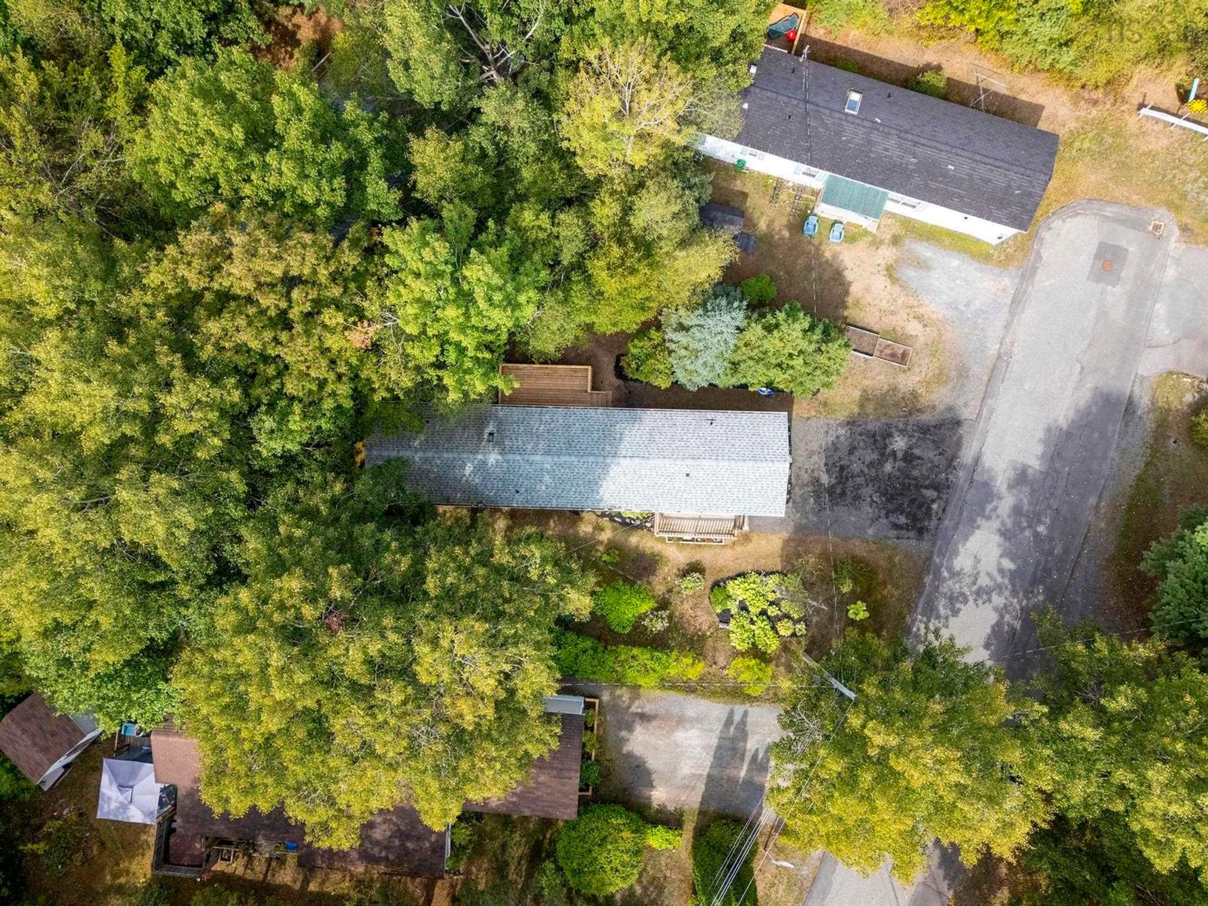 A pic from outside/outdoor area/front of a property/back of a property/a pic from drone, forest/trees view for 31 Pinecrest Dr, New Minas Nova Scotia B4N 4W5