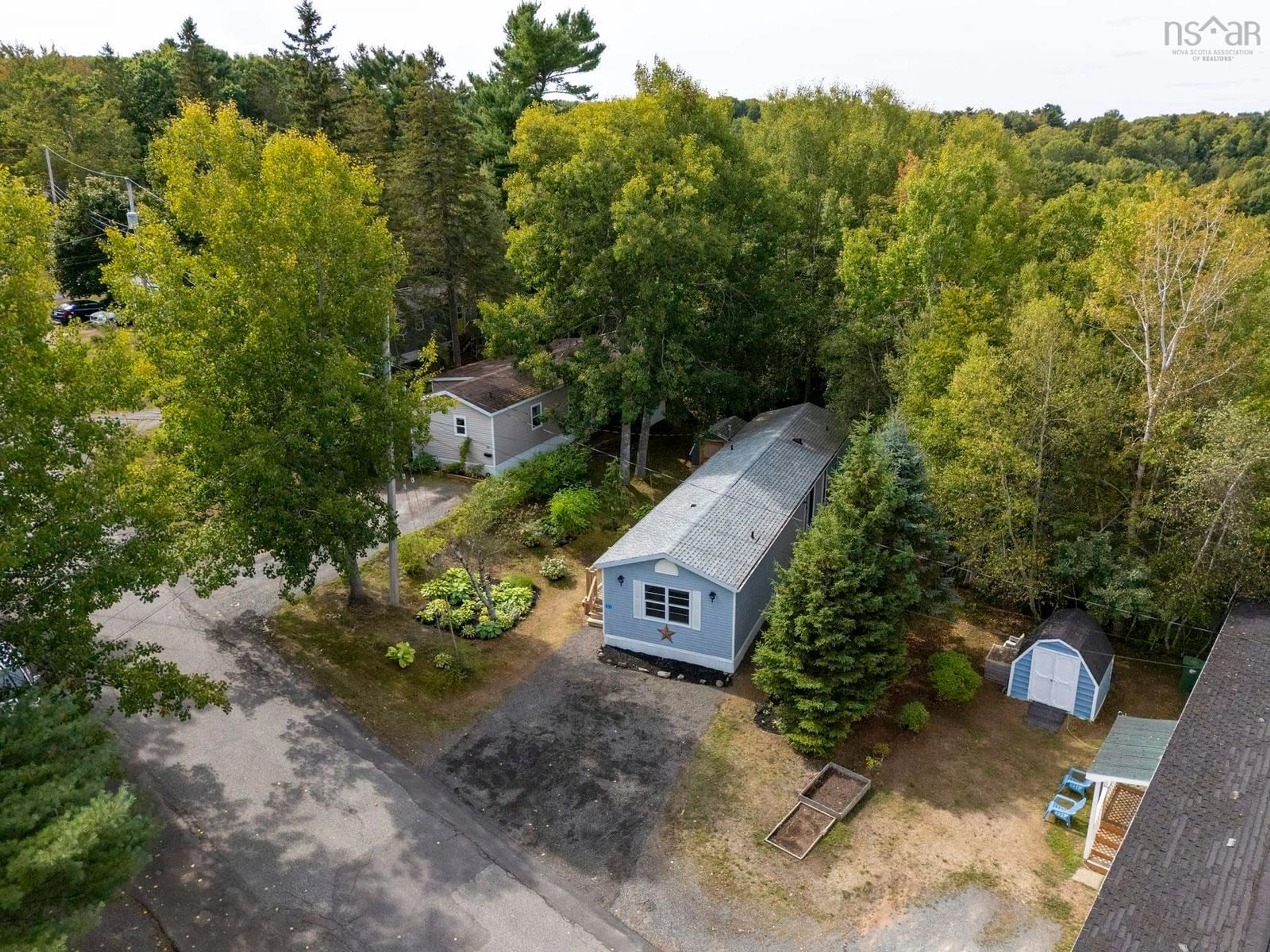A pic from outside/outdoor area/front of a property/back of a property/a pic from drone, forest/trees view for 31 Pinecrest Dr, New Minas Nova Scotia B4N 4W5