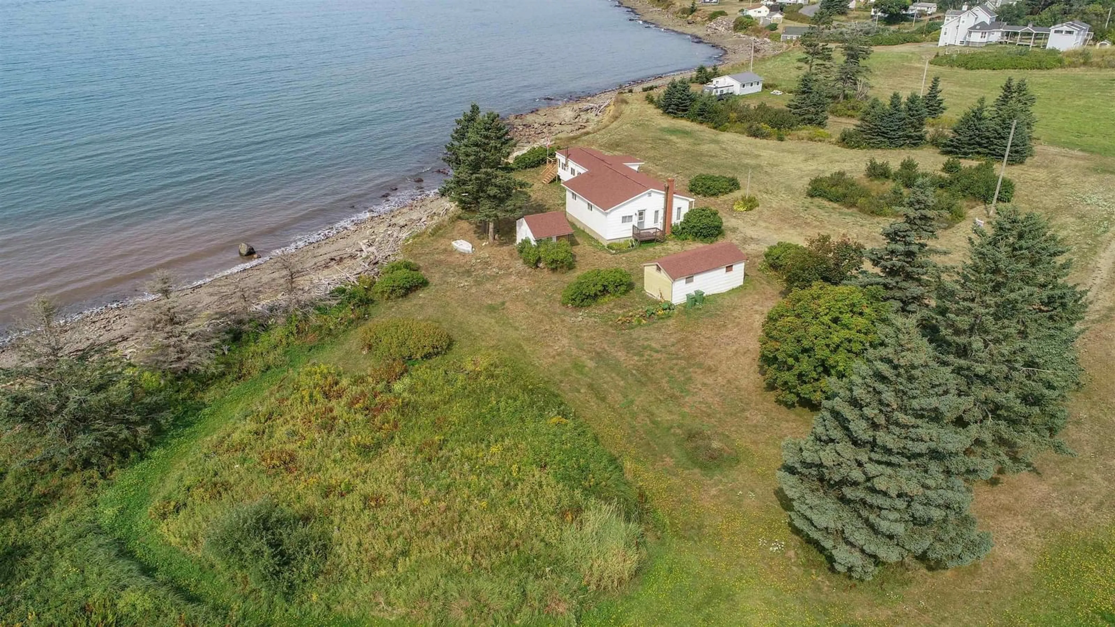 A pic from outside/outdoor area/front of a property/back of a property/a pic from drone, water/lake/river/ocean view for 1472 Cape Split Rd, Scots Bay Nova Scotia B0P 1H0