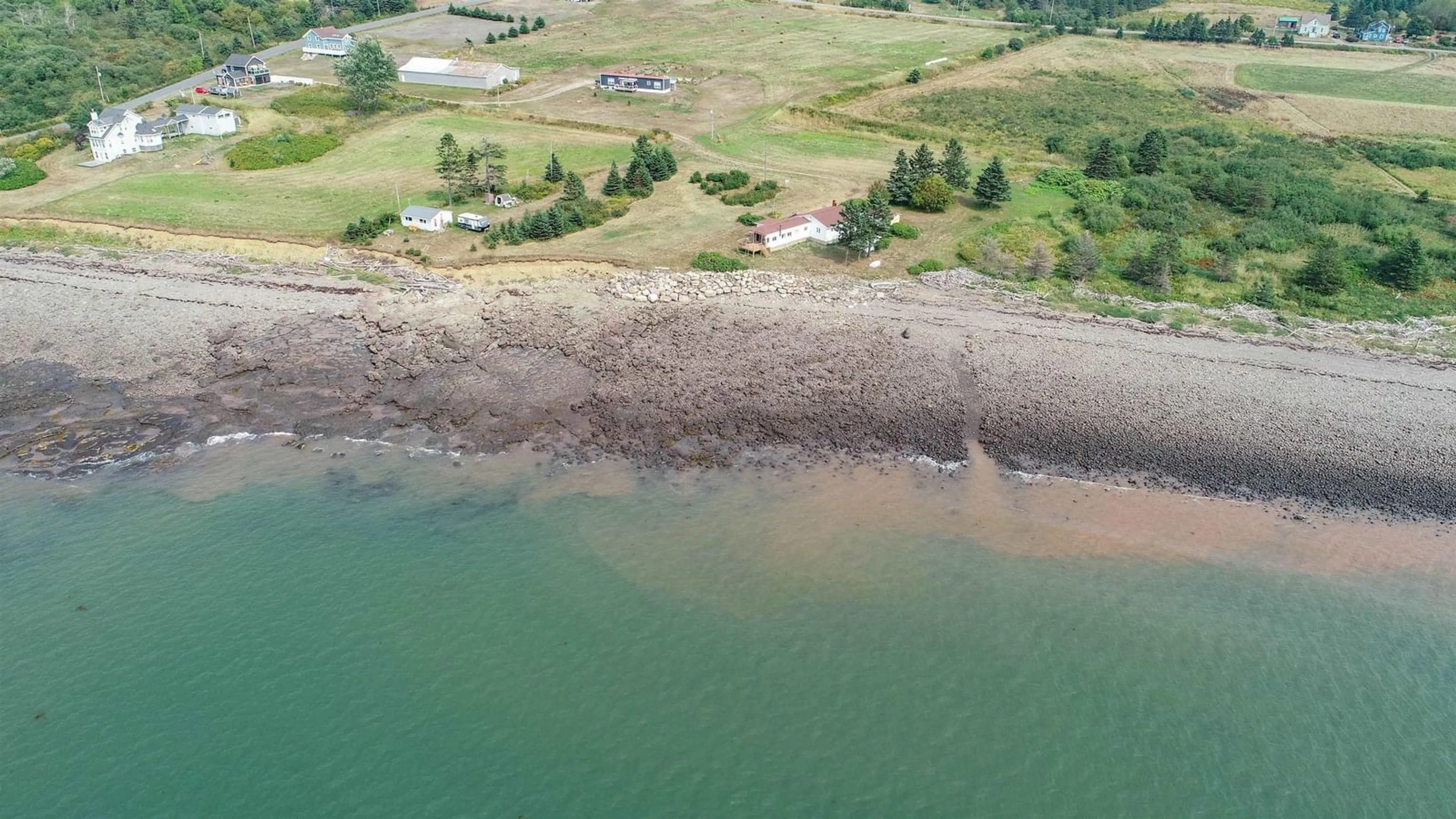 A pic from outside/outdoor area/front of a property/back of a property/a pic from drone, water/lake/river/ocean view for 1472 Cape Split Rd, Scots Bay Nova Scotia B0P 1H0