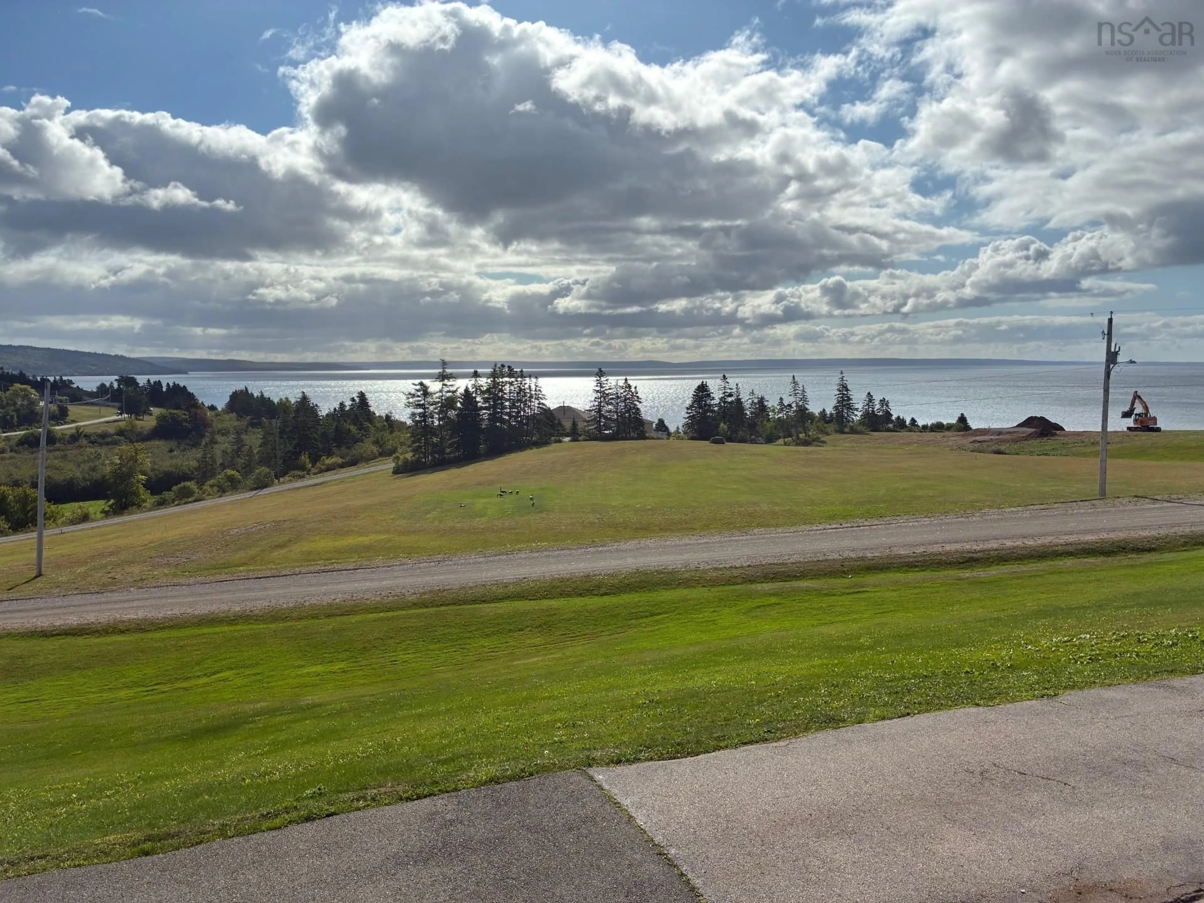 A pic from outside/outdoor area/front of a property/back of a property/a pic from drone, water/lake/river/ocean view for 3456 Highway 223, Jamesville Nova Scotia B2C 1C2