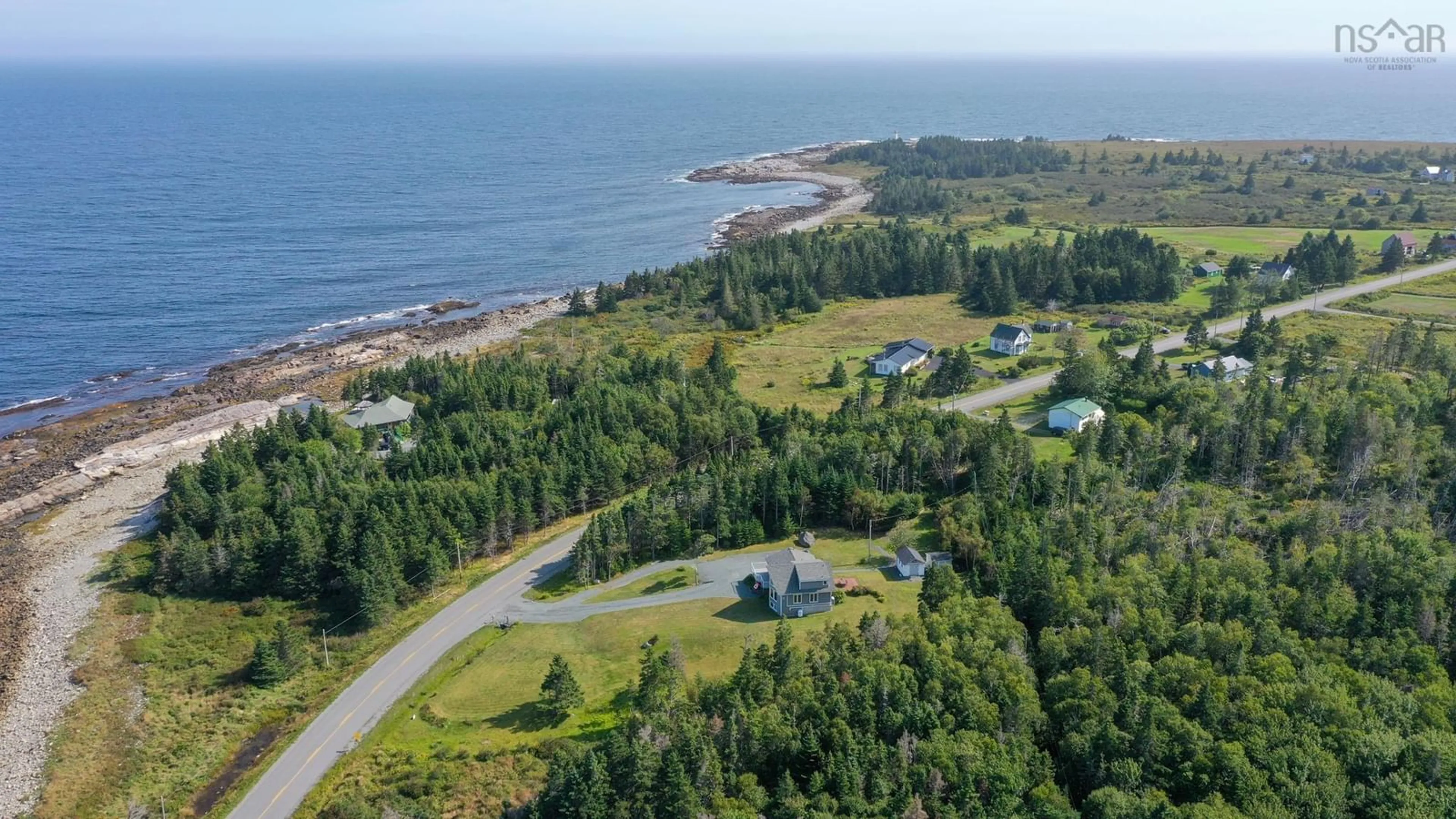 A pic from outside/outdoor area/front of a property/back of a property/a pic from drone, water/lake/river/ocean view for 1228 Rr1 Shore Rd, Western Head Nova Scotia B0T 1K0