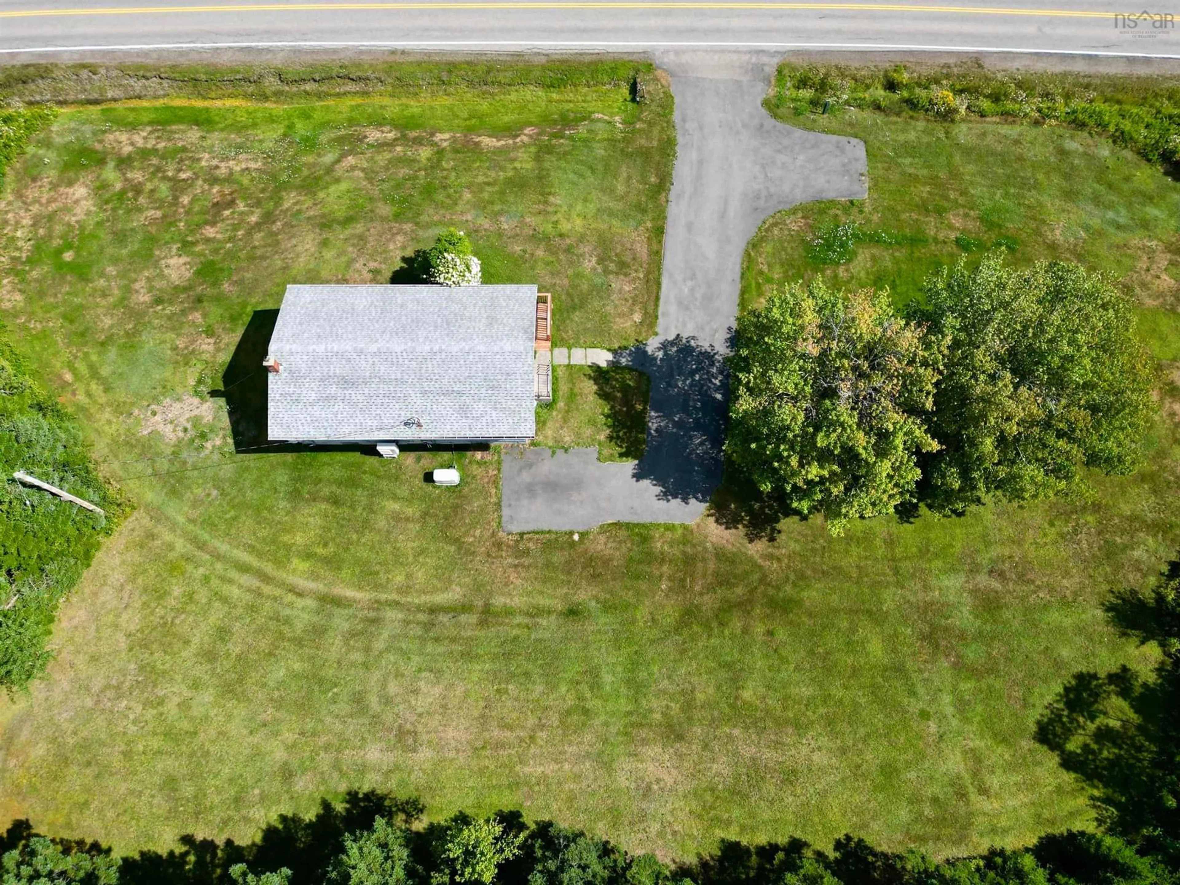 A pic from outside/outdoor area/front of a property/back of a property/a pic from drone, street for 594 Highway 247, Grand Greve Nova Scotia B0E 3B0