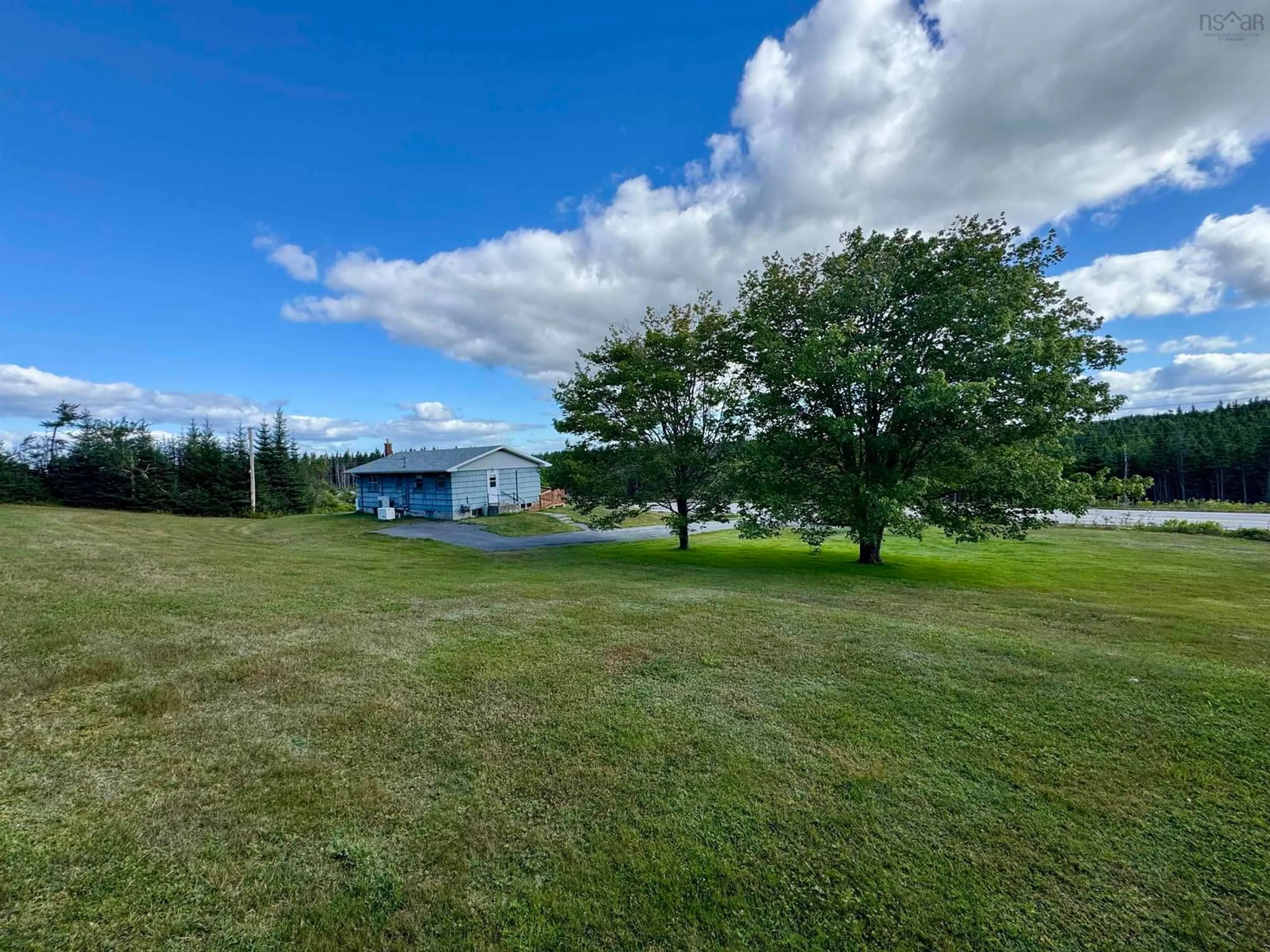 A pic from outside/outdoor area/front of a property/back of a property/a pic from drone, water/lake/river/ocean view for 594 Highway 247, Grand Greve Nova Scotia B0E 3B0