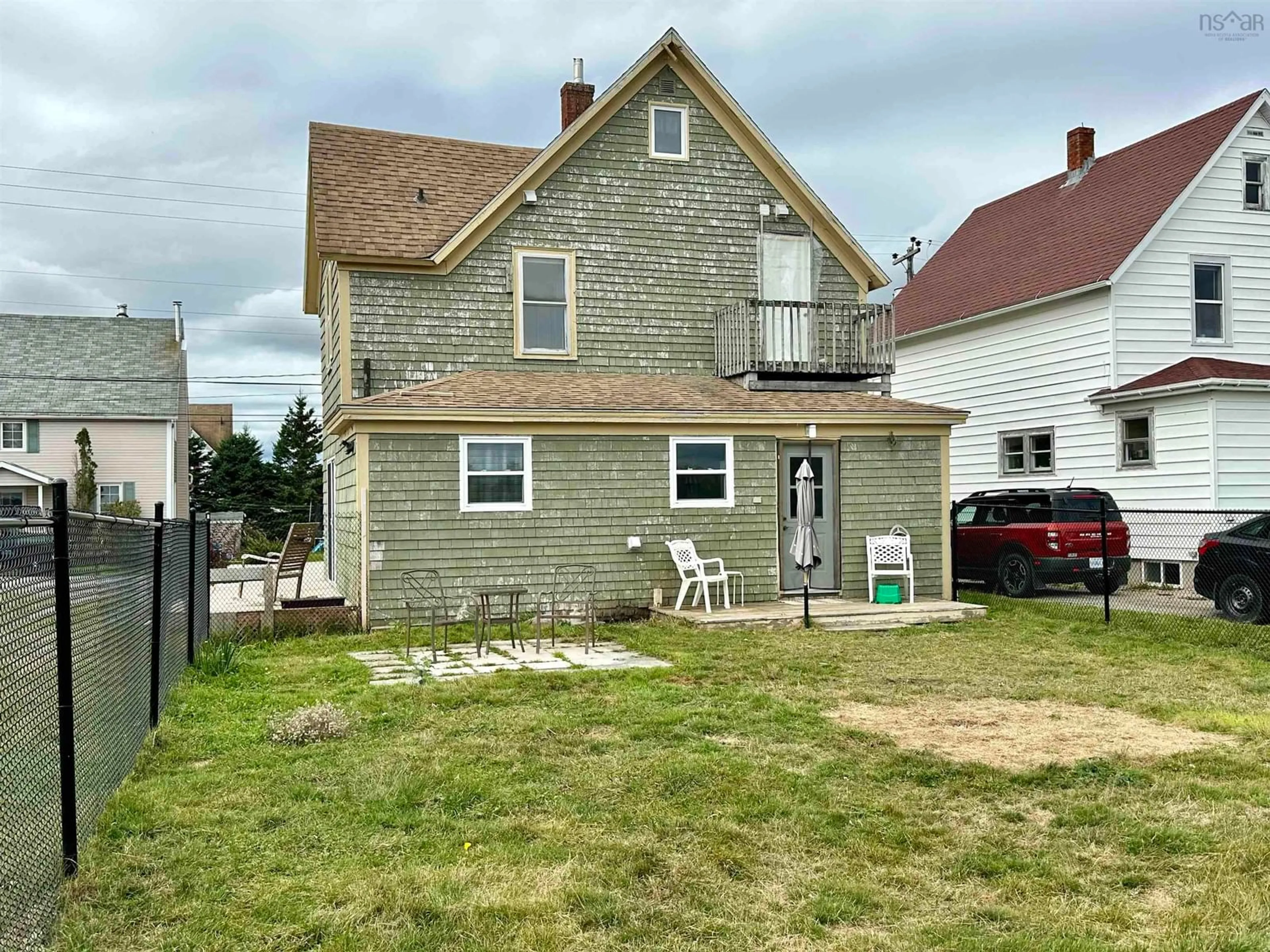 A pic from outside/outdoor area/front of a property/back of a property/a pic from drone, building for 24 Upper Warren St, Louisbourg Nova Scotia B1C 1M8