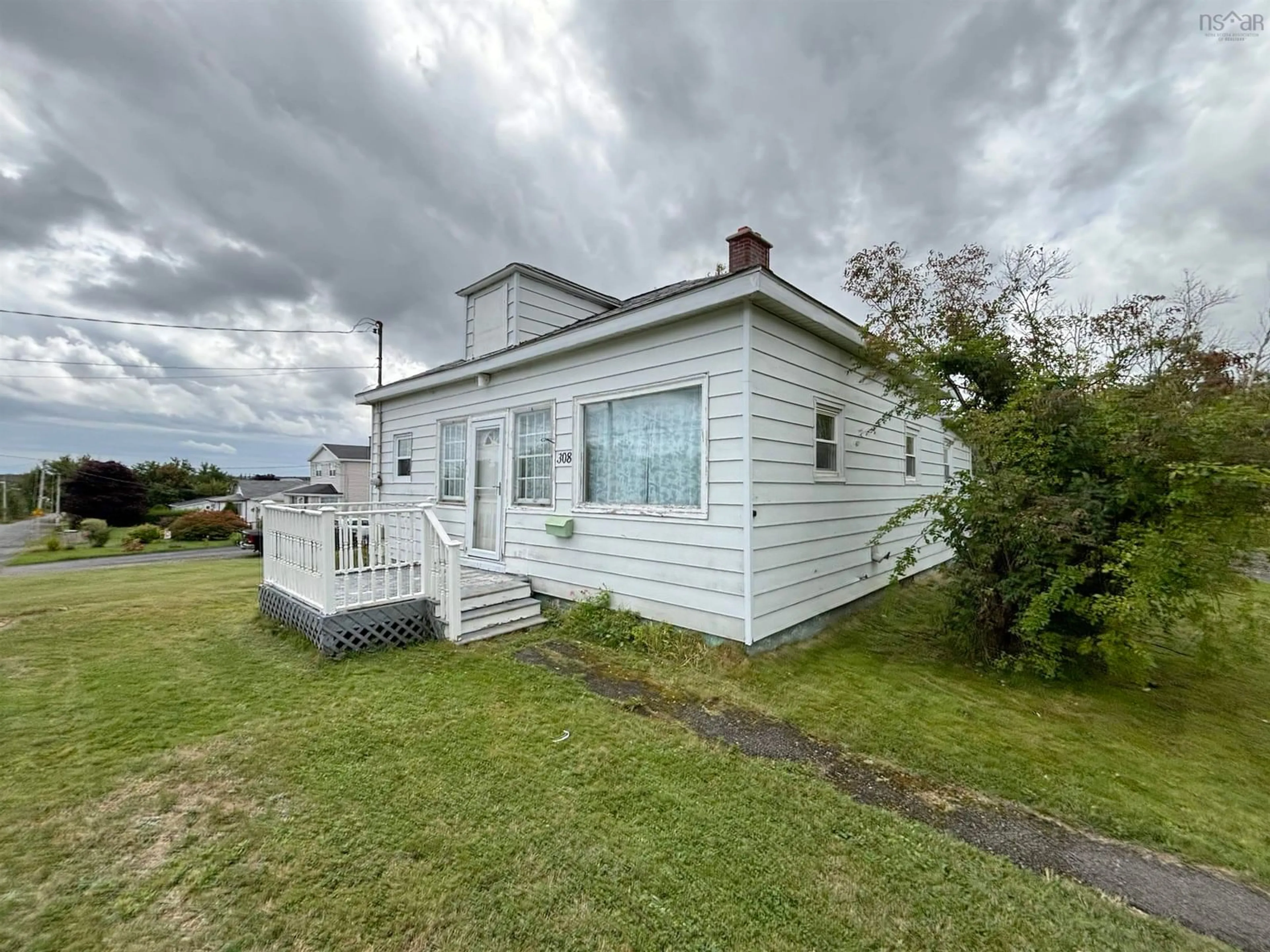 A pic from outside/outdoor area/front of a property/back of a property/a pic from drone, building for 308 Lake Rd, Glace Bay Nova Scotia B1A 2H1