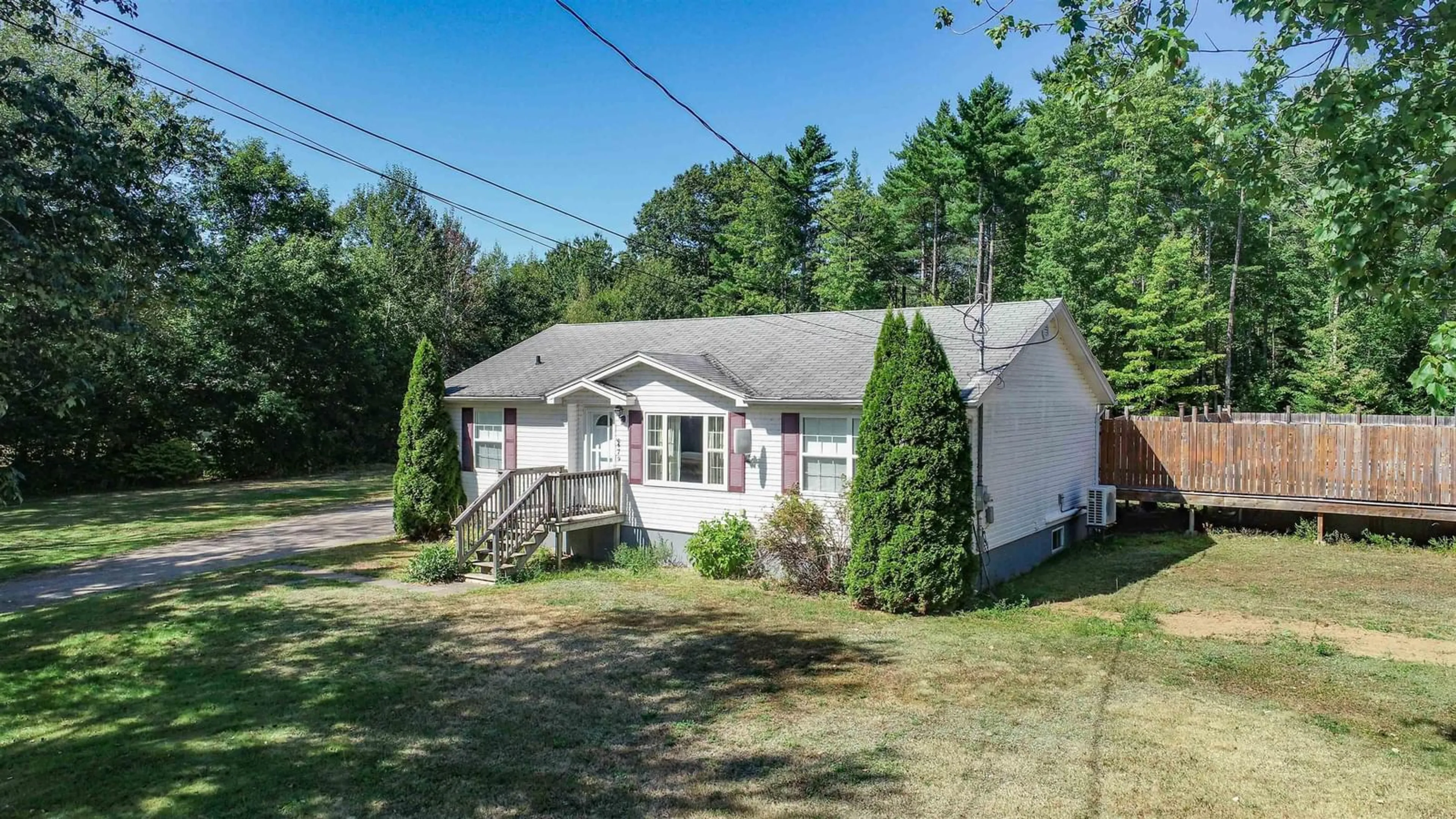 A pic from outside/outdoor area/front of a property/back of a property/a pic from drone, street for 6479 Brooklyn St, Woodville Nova Scotia B0P 1G0