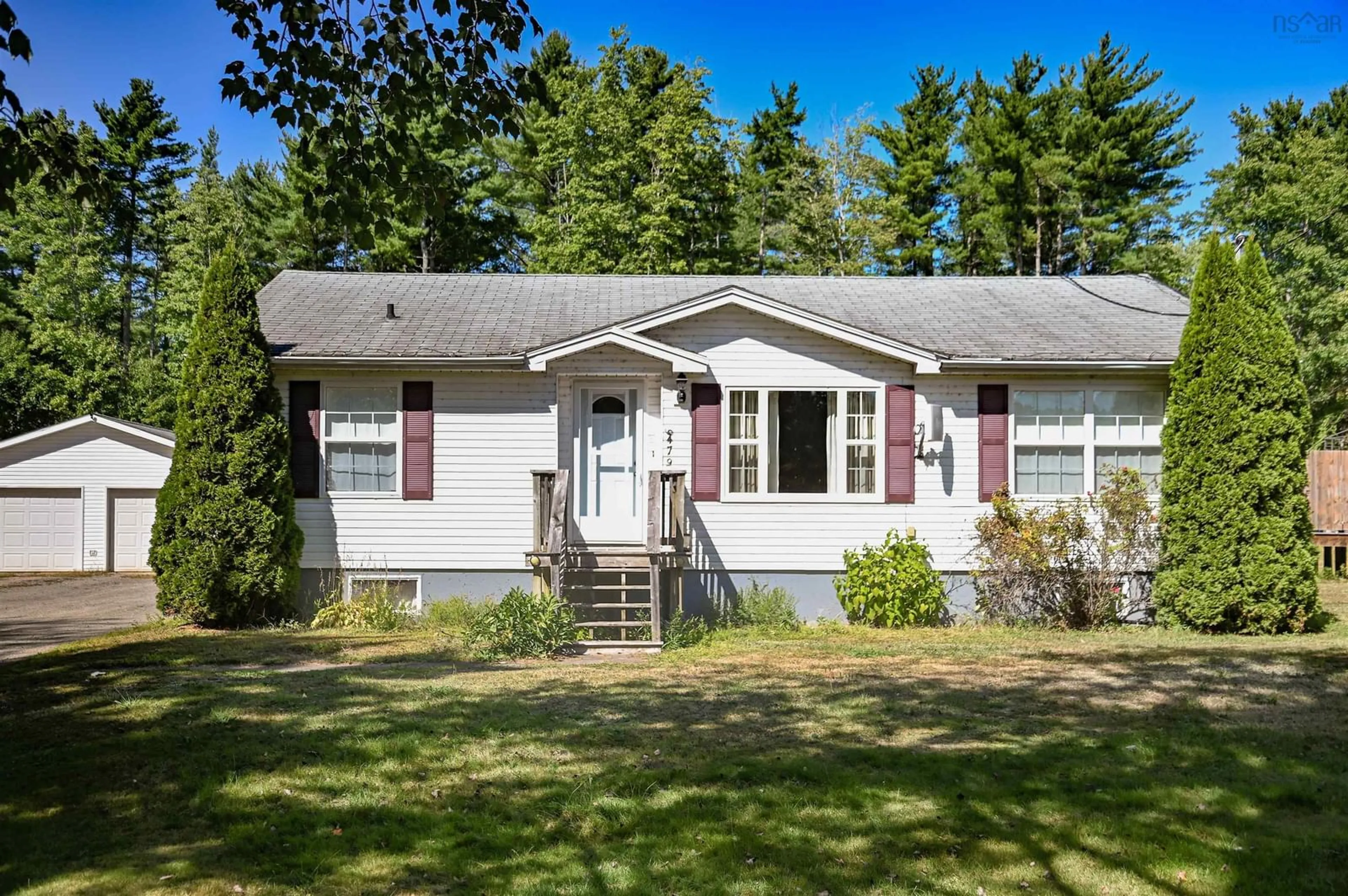 Home with vinyl exterior material, street for 6479 Brooklyn St, Woodville Nova Scotia B0P 1G0