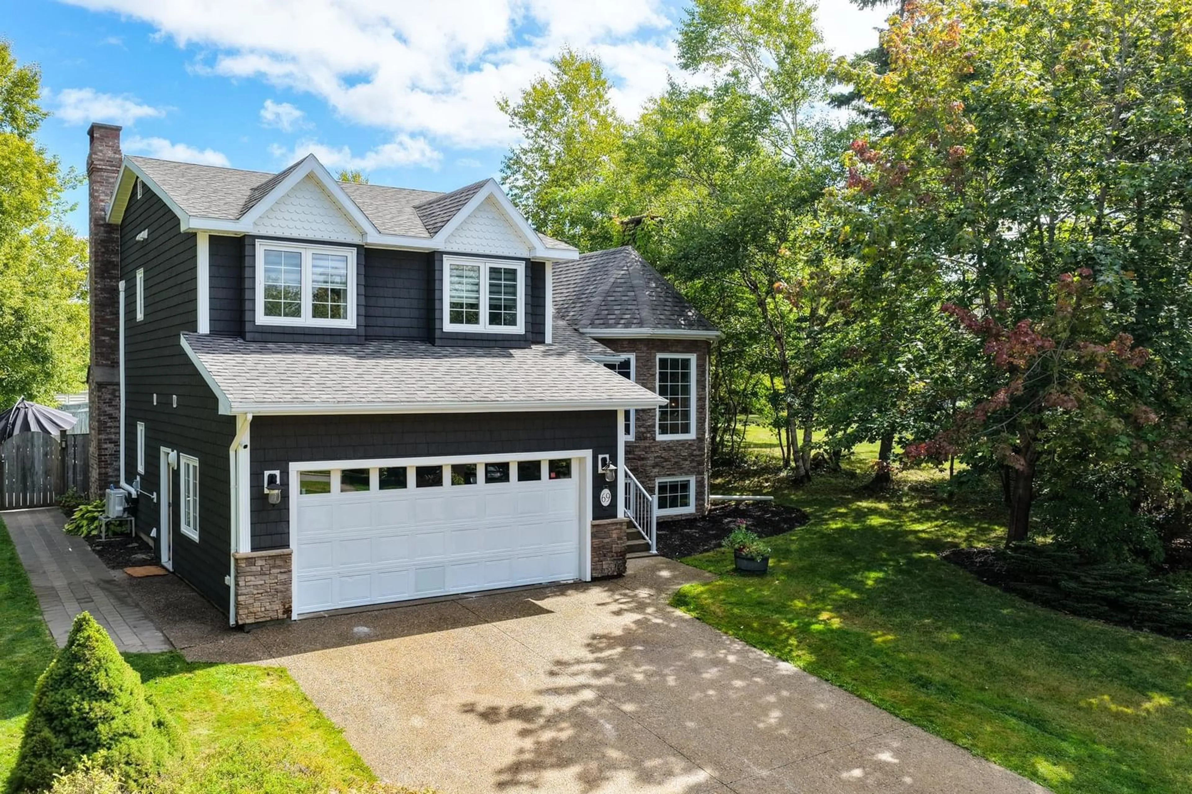 A pic from outside/outdoor area/front of a property/back of a property/a pic from drone, street for 69 Silverwood Dr, Sydney Nova Scotia B1S 2Z9