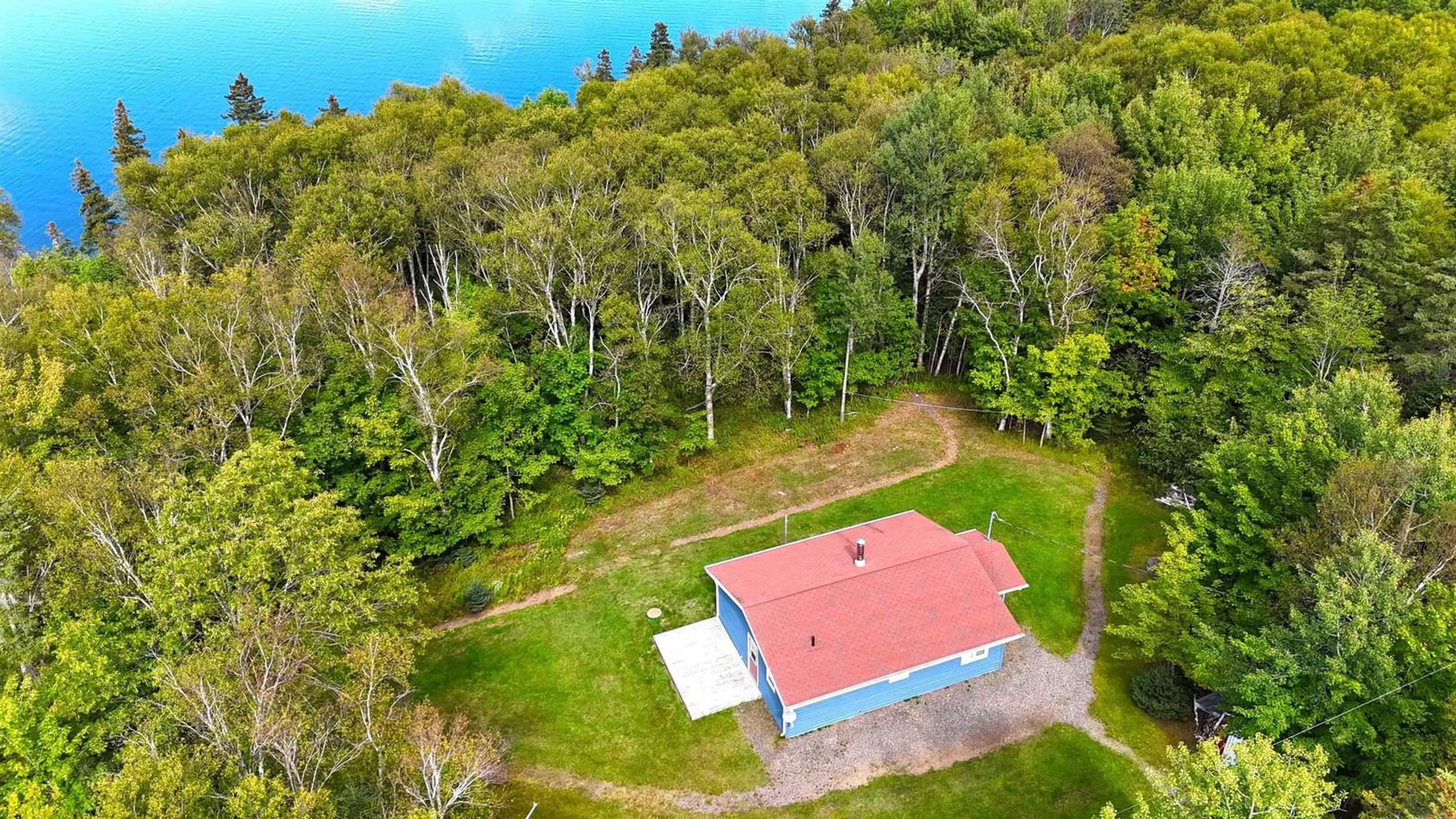 A pic from outside/outdoor area/front of a property/back of a property/a pic from drone, water/lake/river/ocean view for 5735 West Bay Rd, Roberta Nova Scotia B0E 3K0